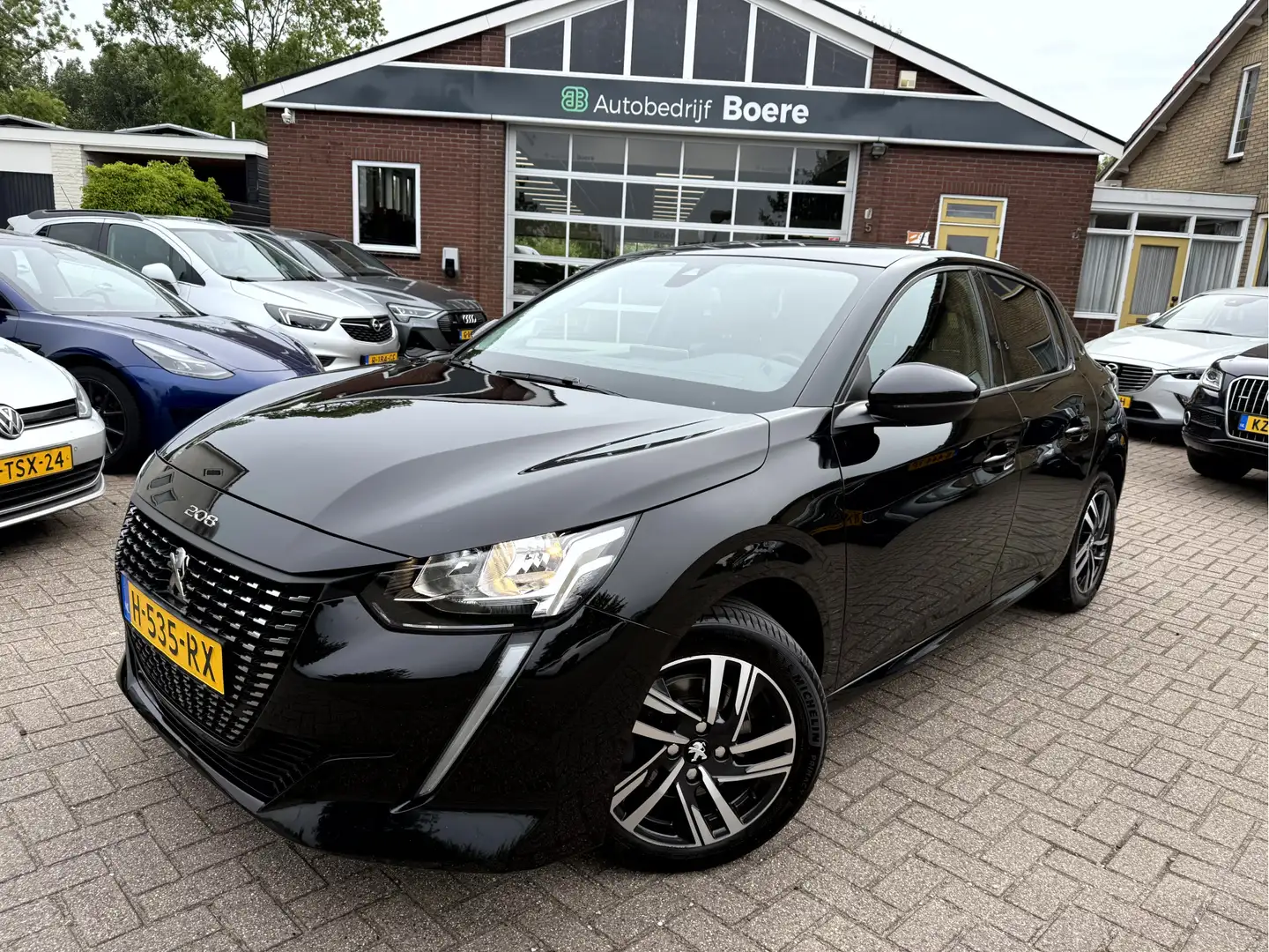 Peugeot 208 1.5 BlueHDi Allure Panoramadak, Camera, App Connec Noir - 1