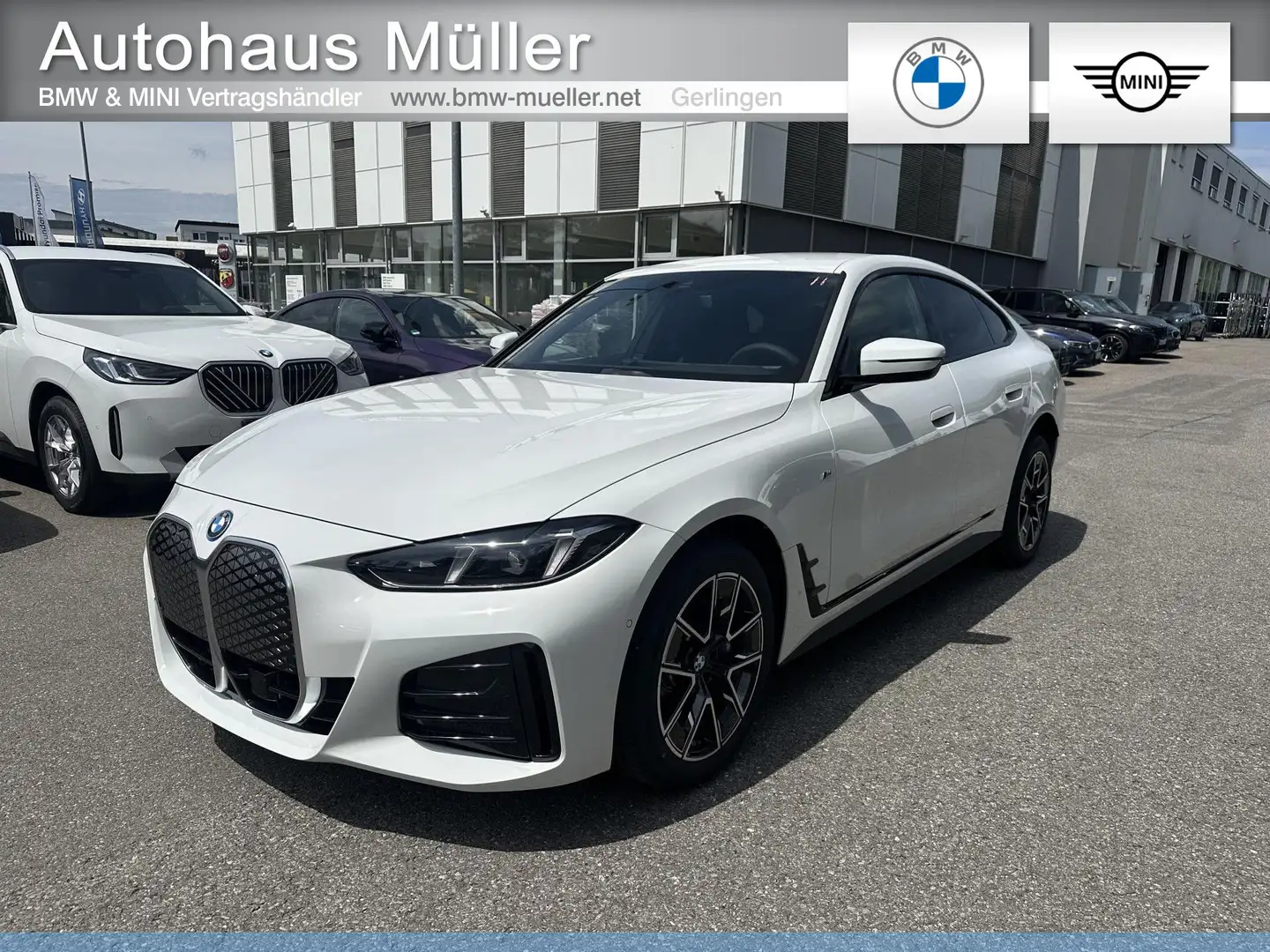 BMW i4 eDrive40 0,25% M Sport AHK ACC HiFi Keyless LED Wit - 1