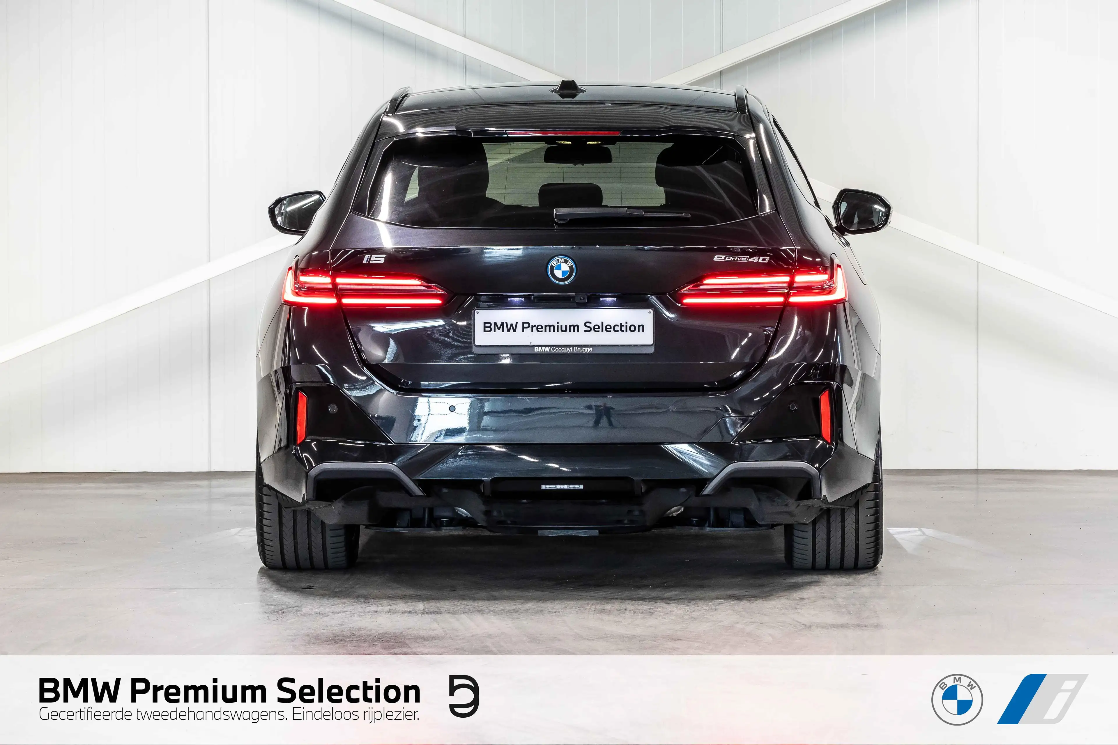 BMW i5 eDrive40 Touring M Sport Pro | PANO | Drive + | Pa — photo 4