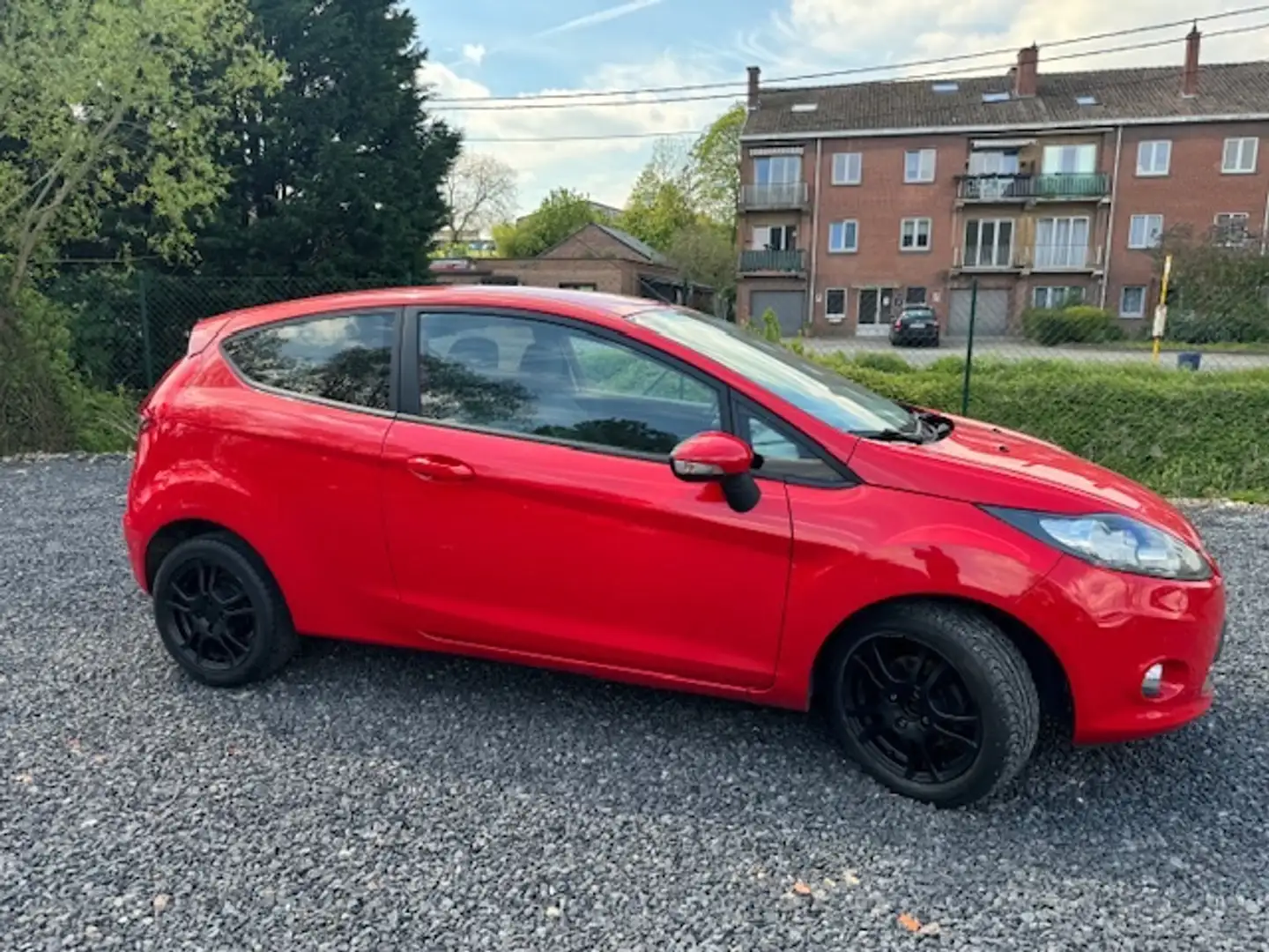 Ford Fiesta 1.25i Champions Plus Edition Rood - 1