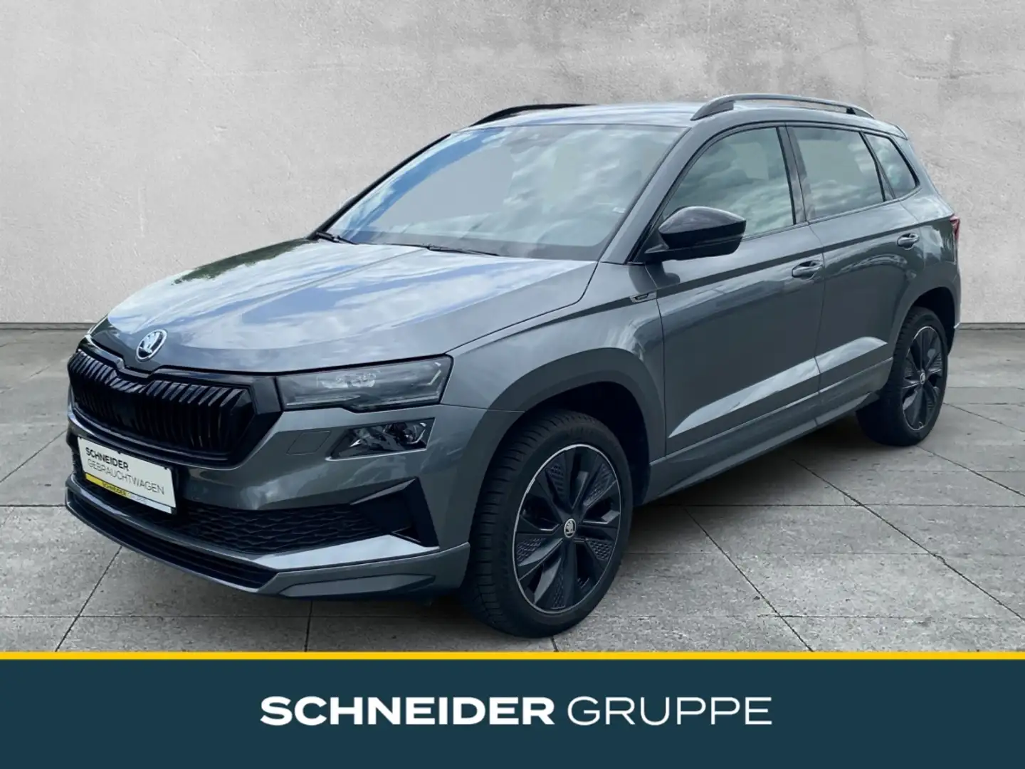 Skoda Karoq Sportline 1.5 TSI DSG LED+NAVI+SHZ+KAMERA Grau - 1