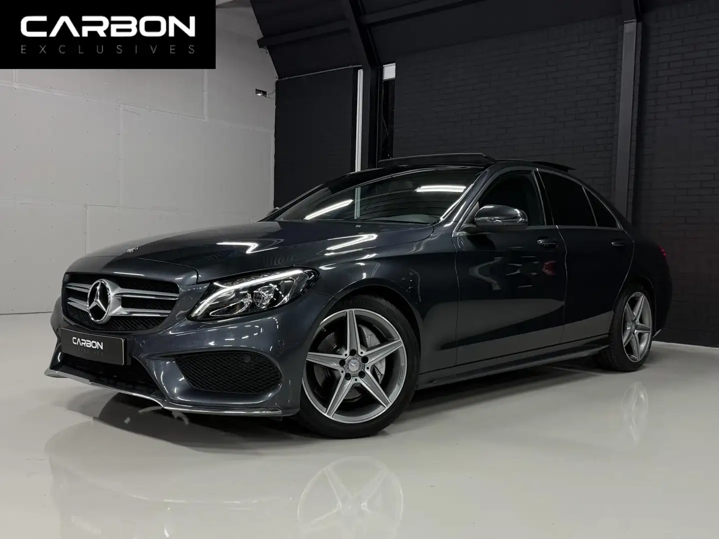 Mercedes-Benz C 180 AMG | Pano | Leder | Navi | CC Grijs - 1