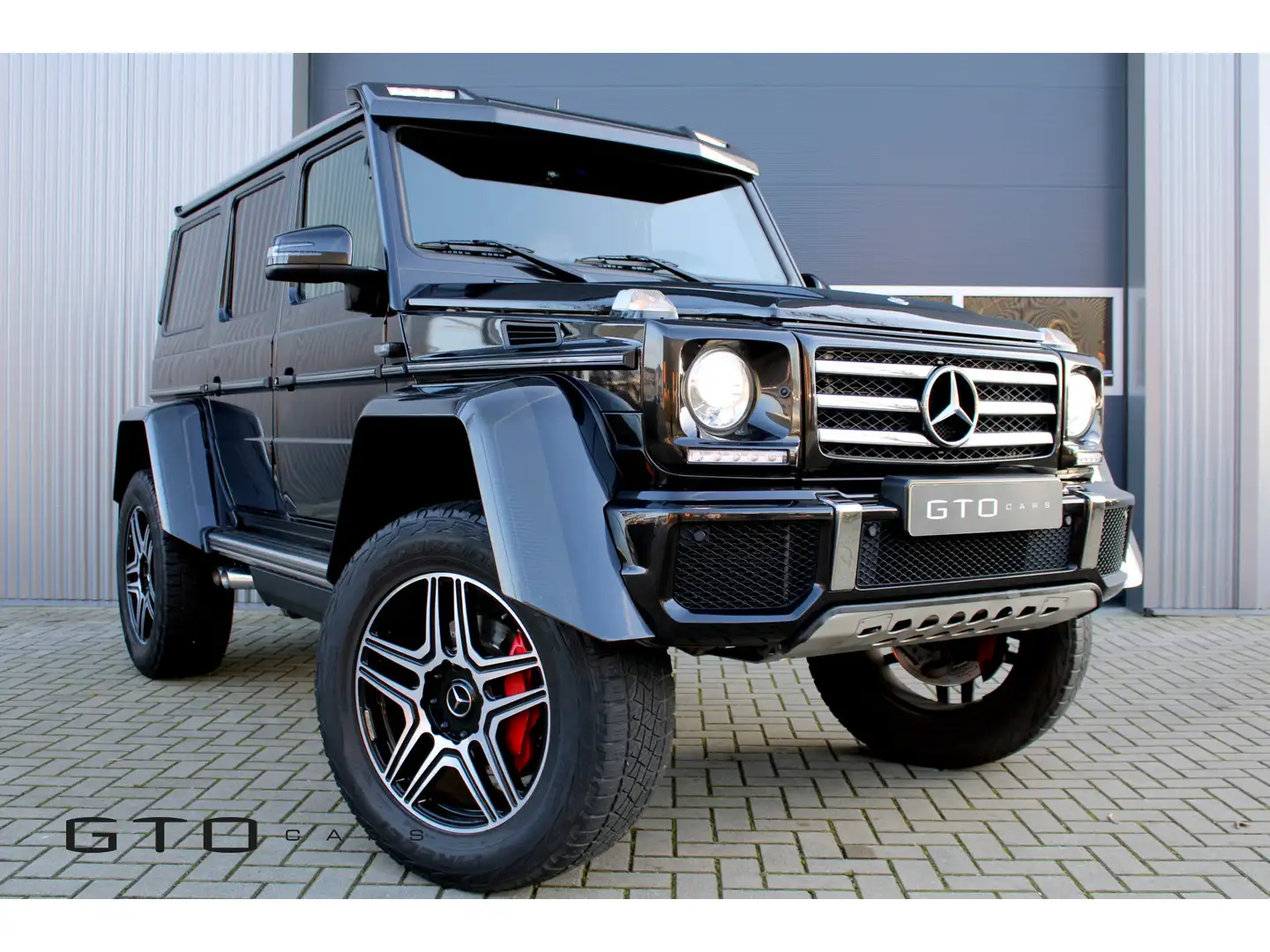 Mercedes-Benz G 500 4x4² Pano/Brabus Uitlaat/Custom Audio/Carbon Zwart - 1