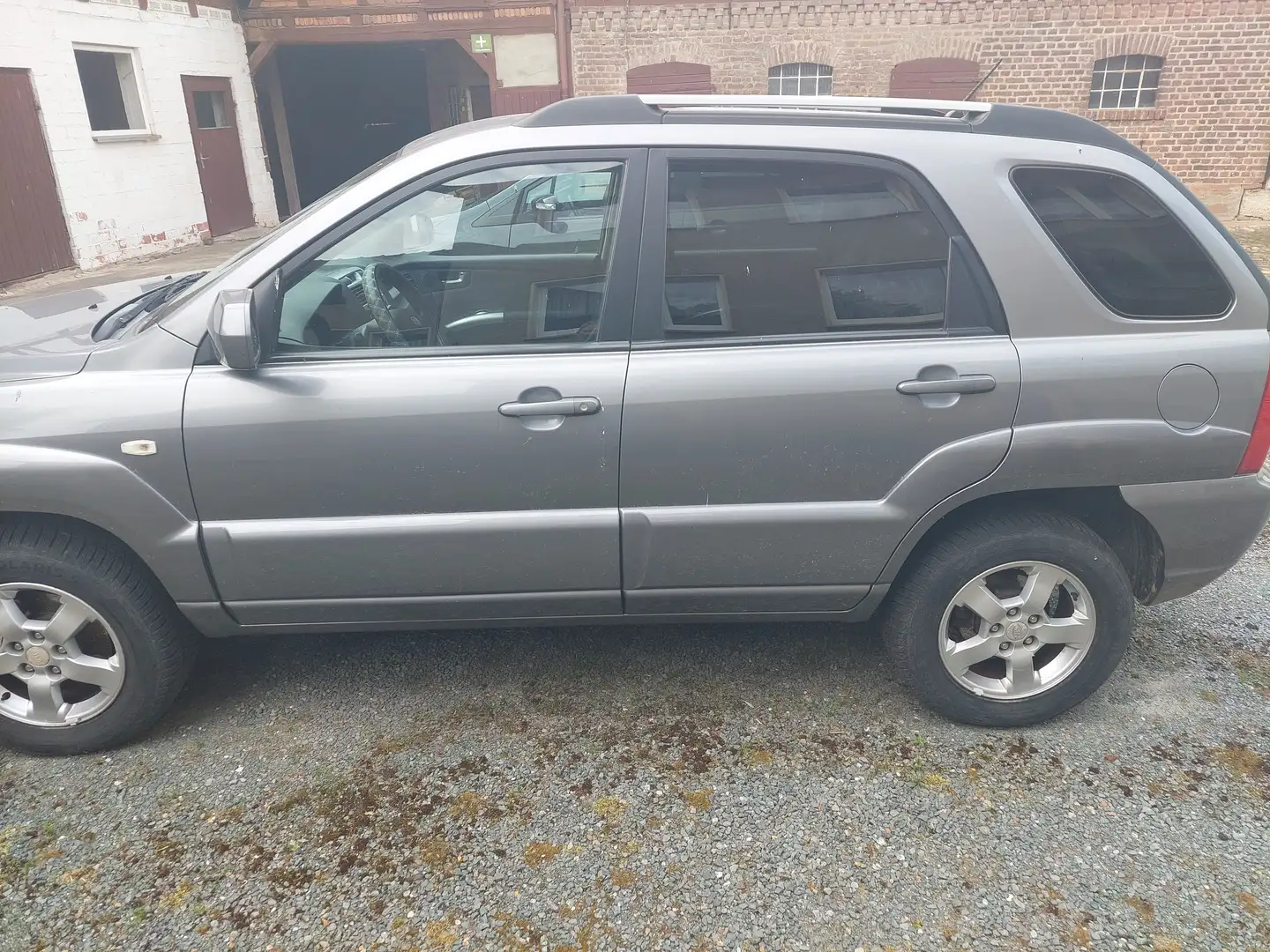 Kia Sportage Серый - 1