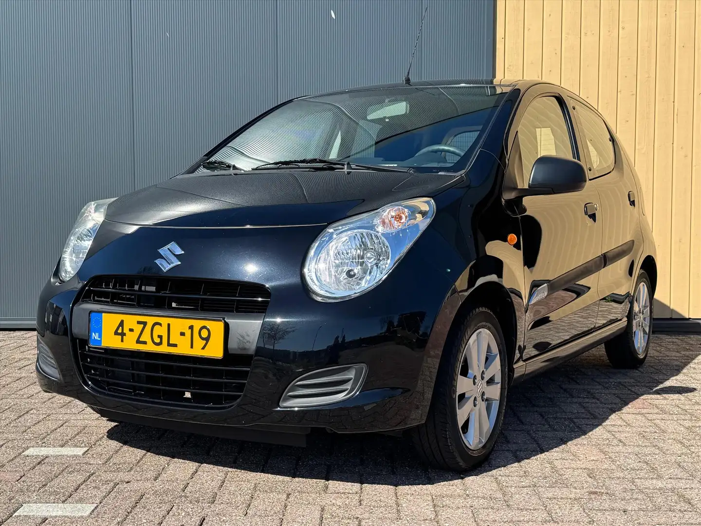 Suzuki Alto 1.0 68pk Celebration Easss | NL Auto | Airco | LMV Schwarz - 1
