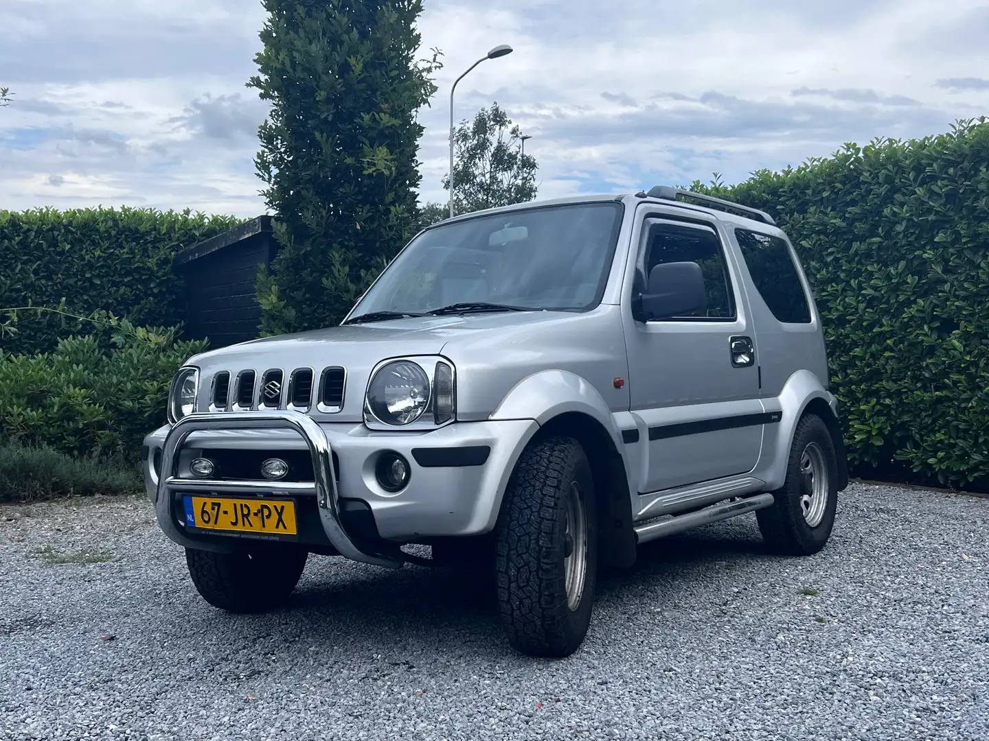 Suzuki Jimny 1.3 JLX Grijs - 1