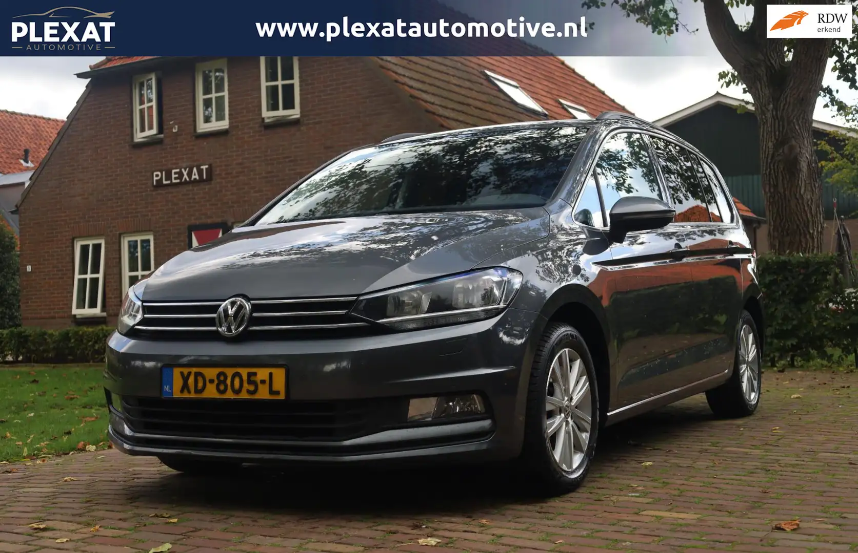 Volkswagen Touran 1.4 TSI Connected Series 7p Aut. | Stoelverwarming Zwart - 1