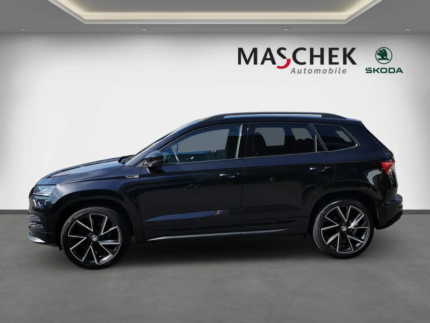 Skoda Karoq Sportline 2.0 TSI LED VC ACC Standh PDC Navi Sitzh Schwarz - 2
