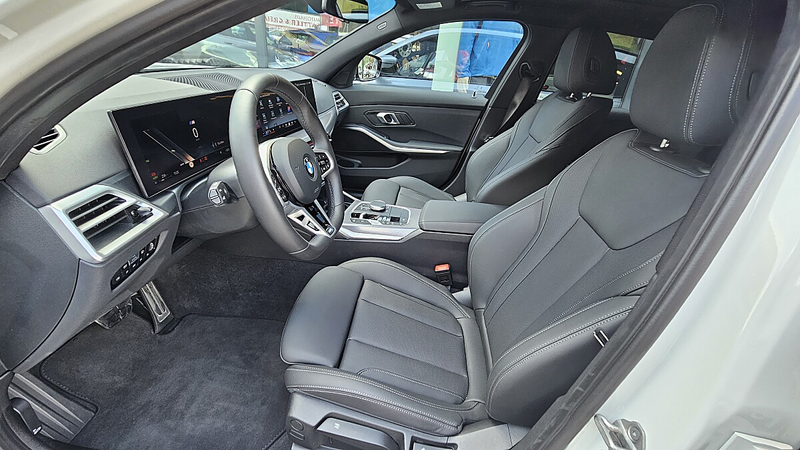 BMW 320 d 48 V xDrive Touring Aut. — photo 13