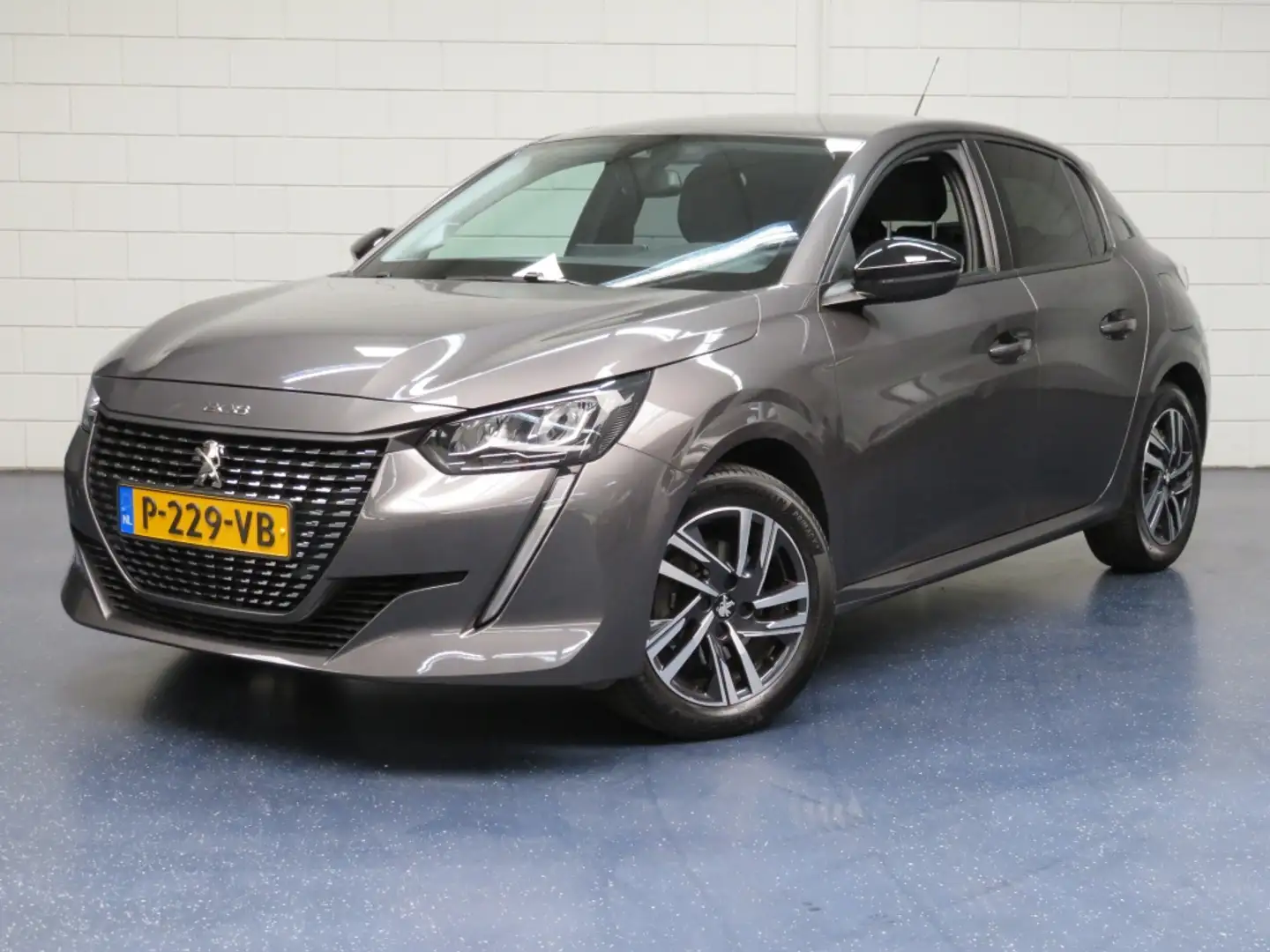 Peugeot 208 1.2 PureTech Allure Grijs - 1