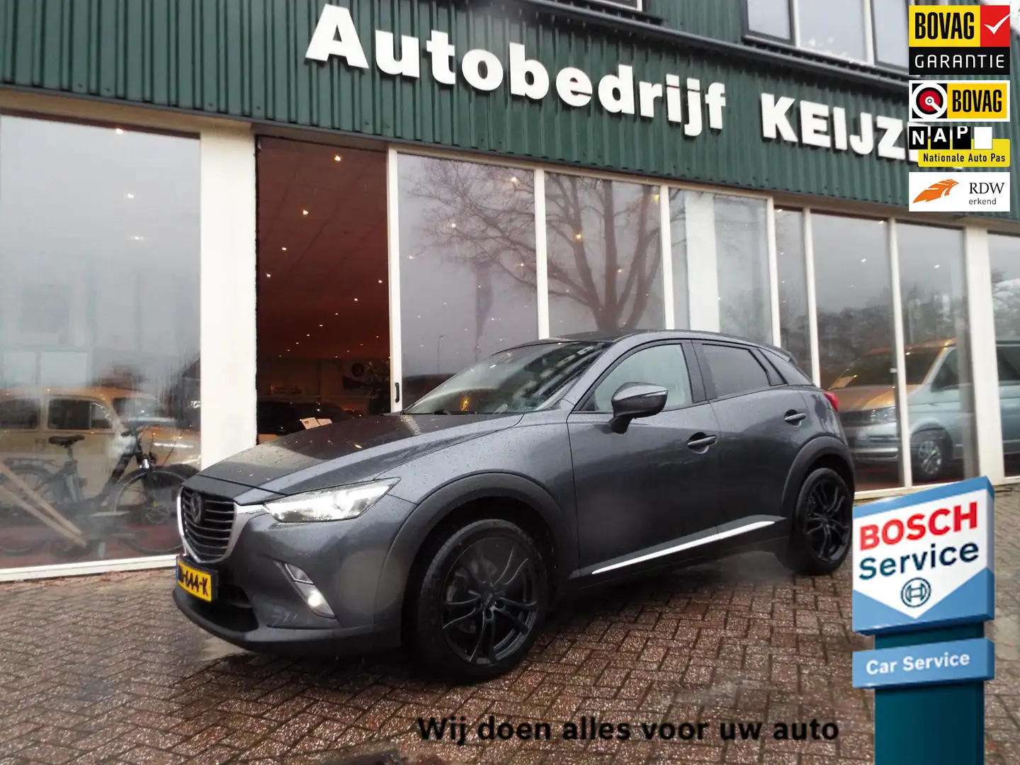Mazda CX-3 2.0 SkyActiv-G 120 GT-M LEER-CAMERA-NAVI-12MND BOV Gris - 1