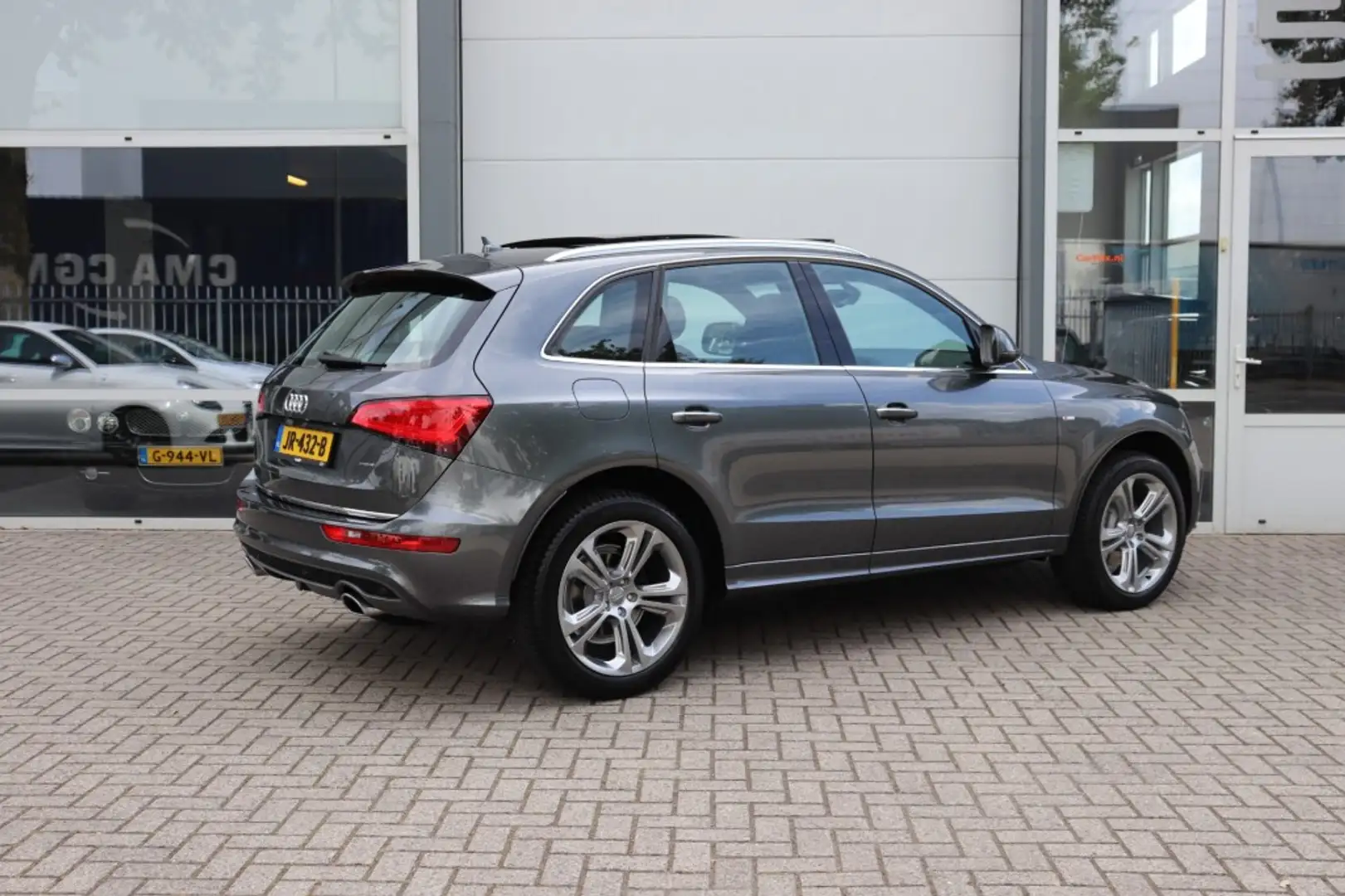 Audi Q5 2.0 TFSI quattro Adrenalin Sport / ORIG.NL / PANO Grau - 2