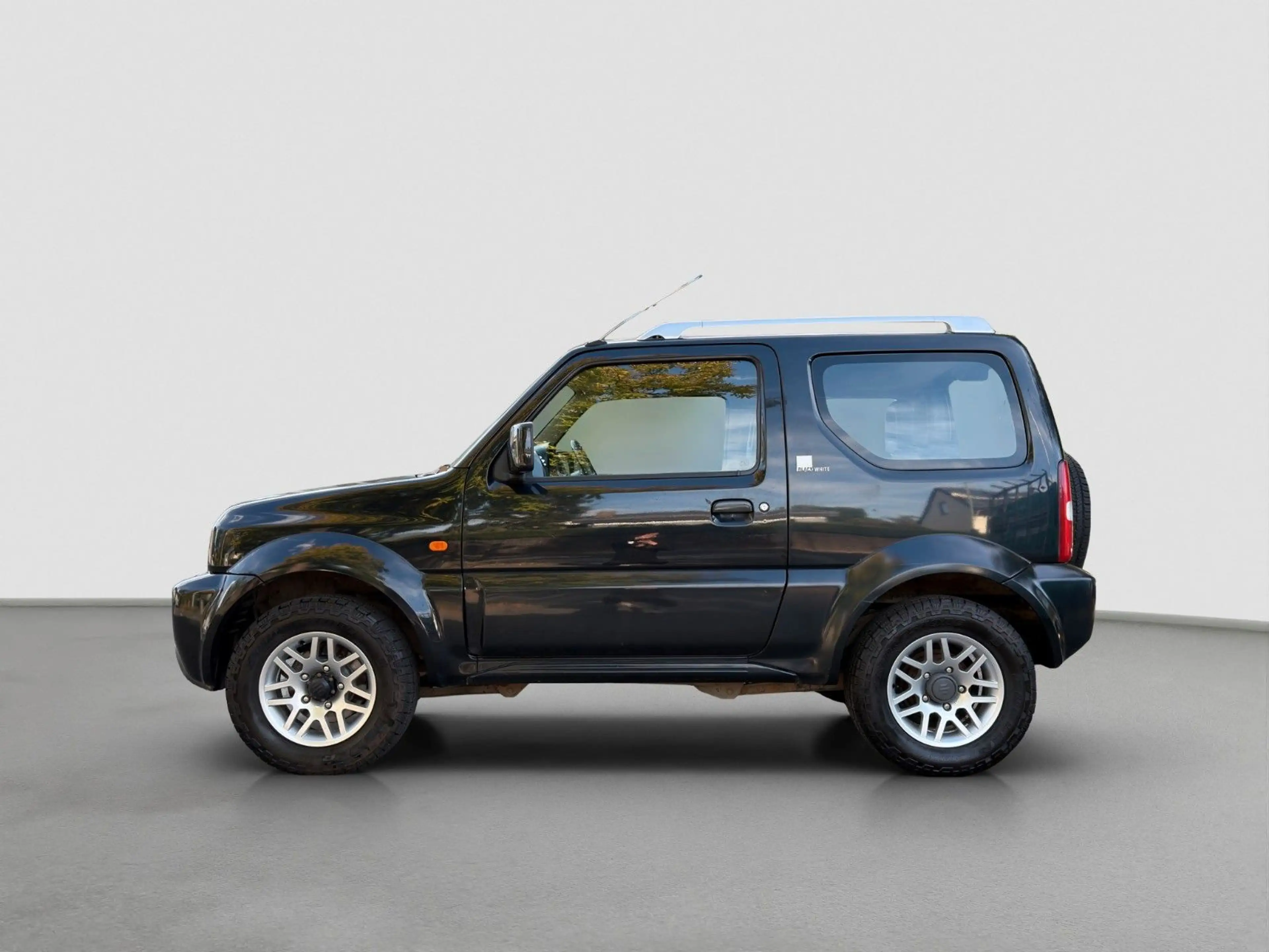 Suzuki Jimny Black and White Lim.*1.Hand*Klimaanlage — photo 4