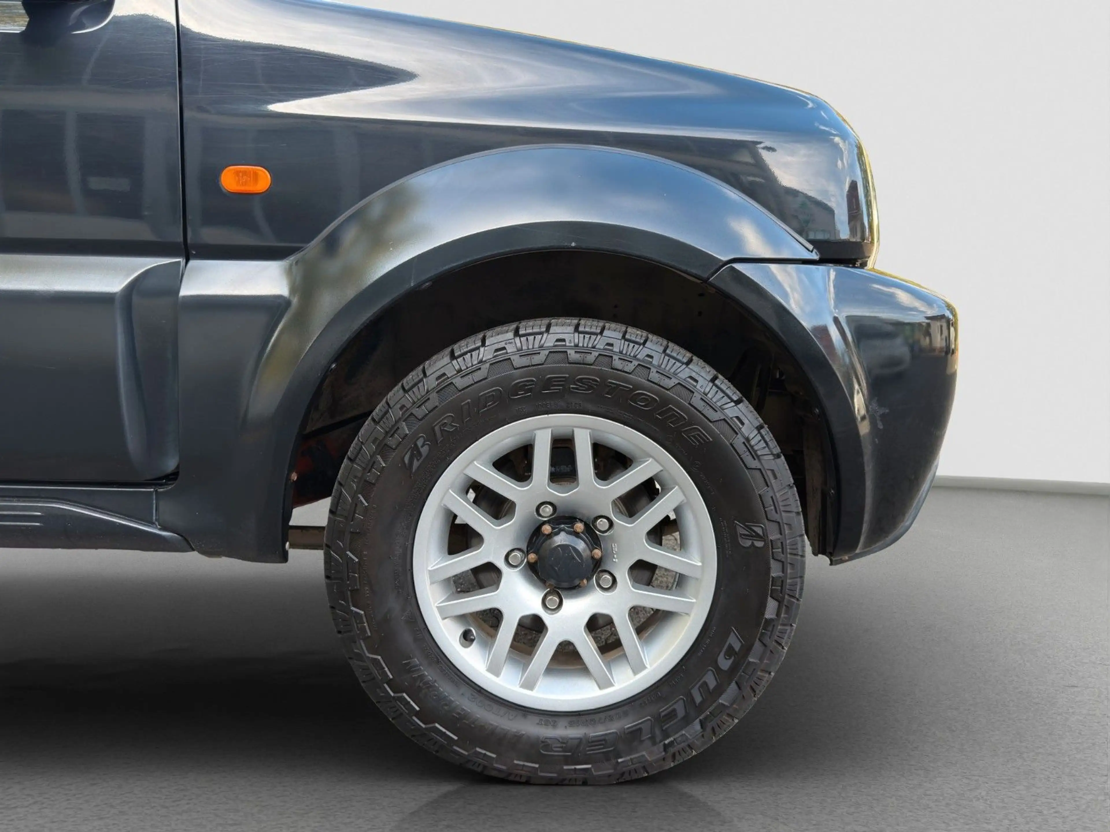 Suzuki Jimny Black and White Lim.*1.Hand*Klimaanlage — photo 14