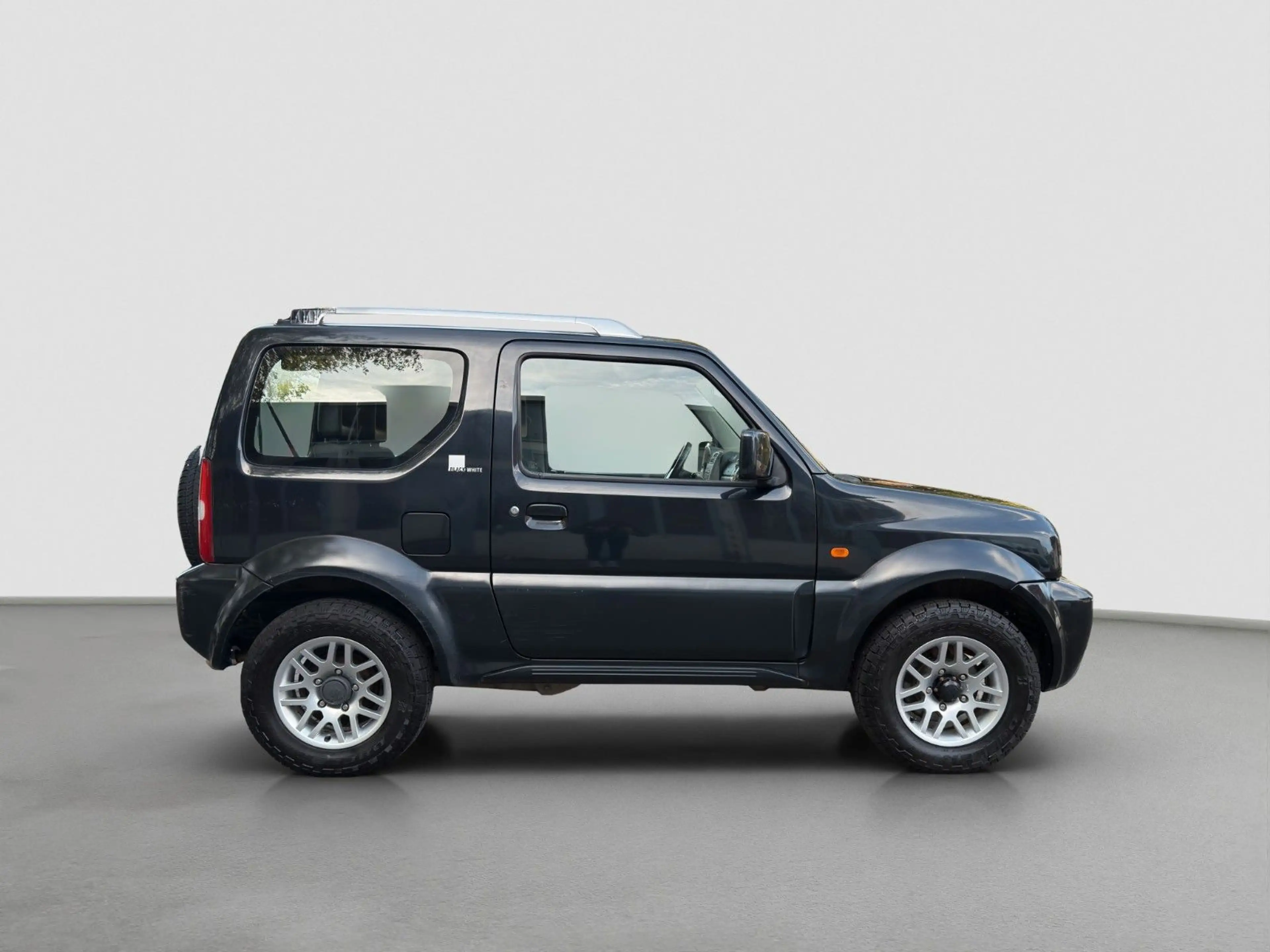 Suzuki Jimny Black and White Lim.*1.Hand*Klimaanlage — photo 8