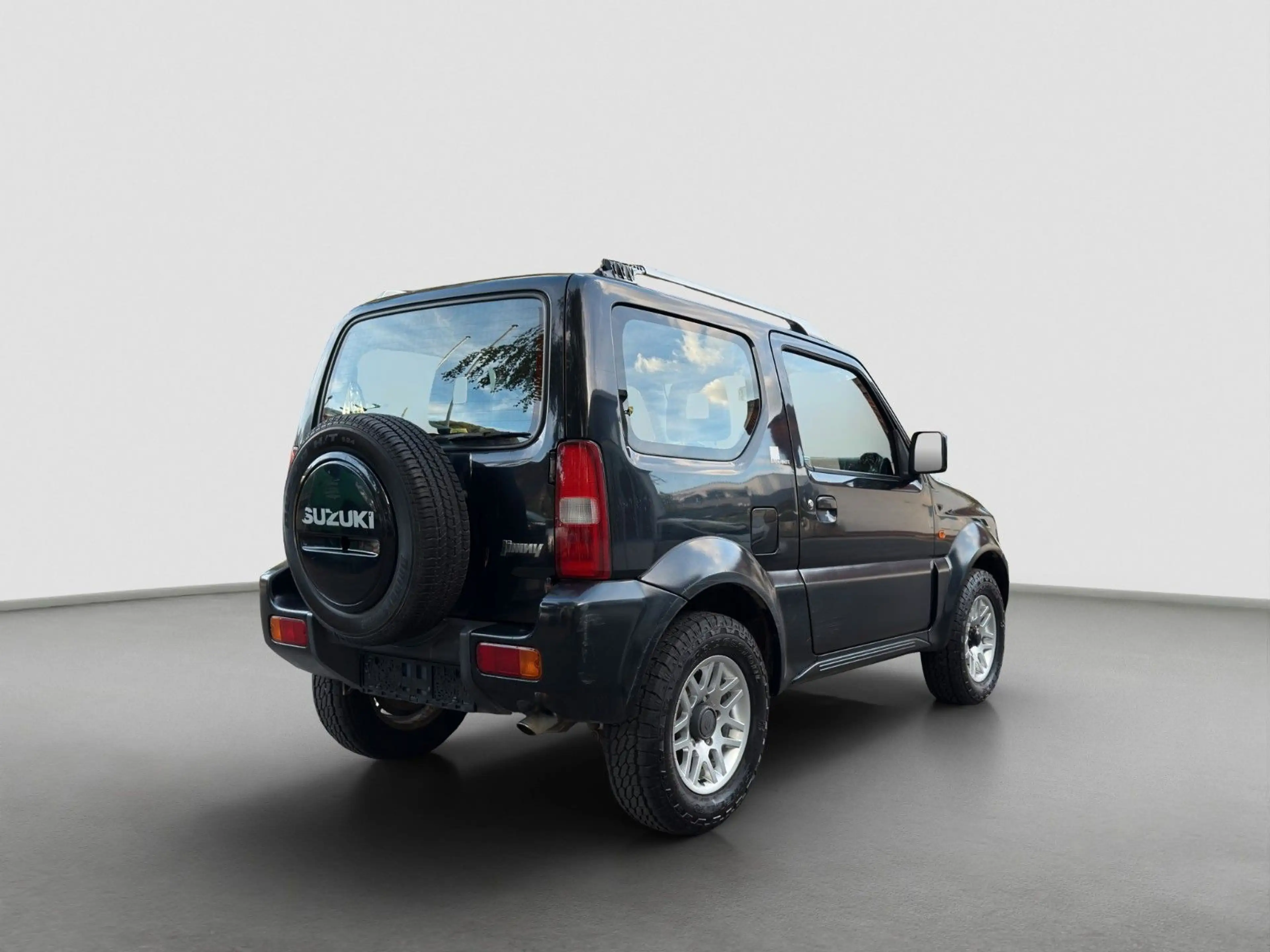 Suzuki Jimny Black and White Lim.*1.Hand*Klimaanlage — photo 7