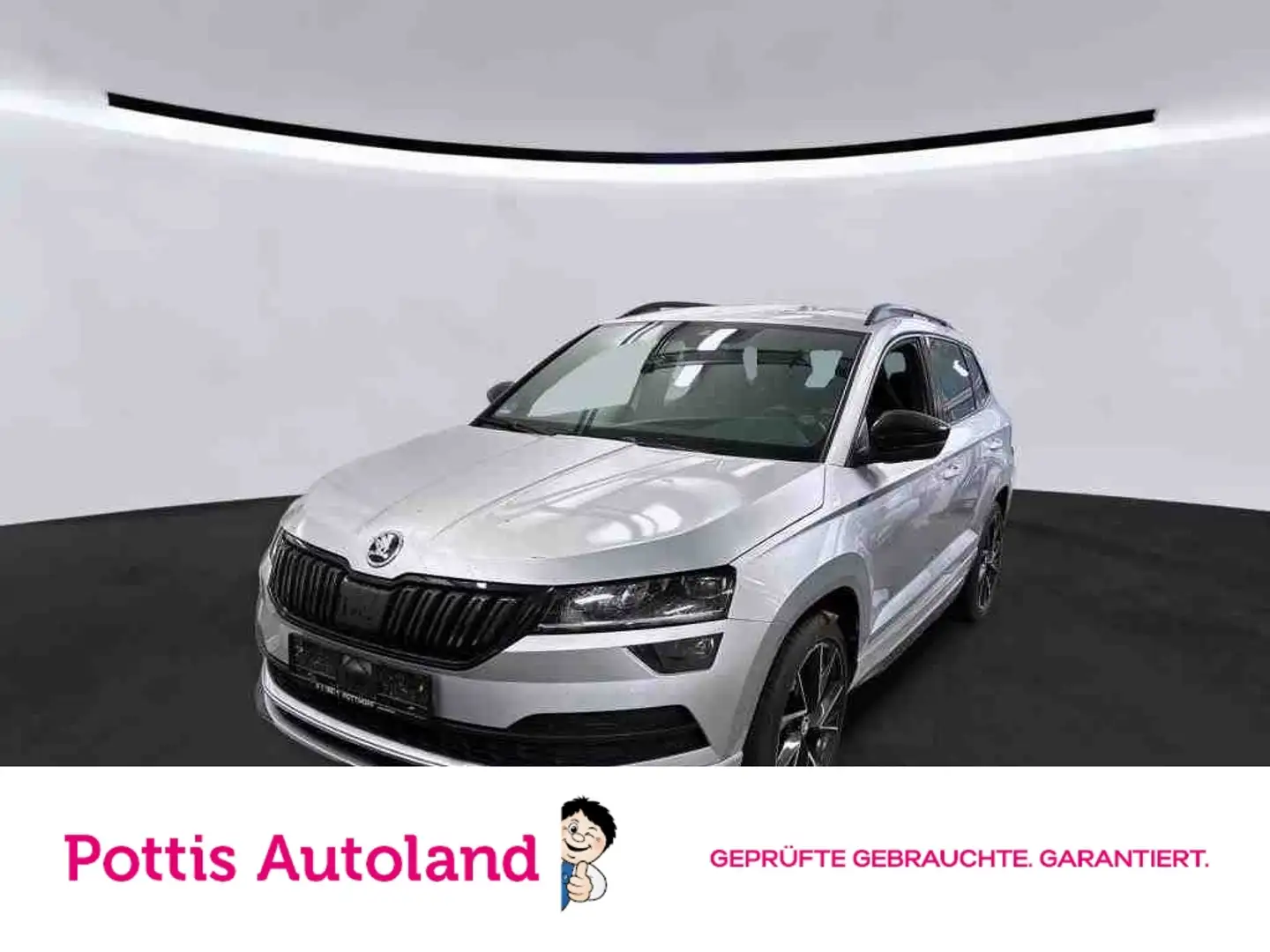 Skoda Karoq 2.0 TSI DSG 4x4 SPORTLINE AHK NAVI PDC ACC Silber - 1
