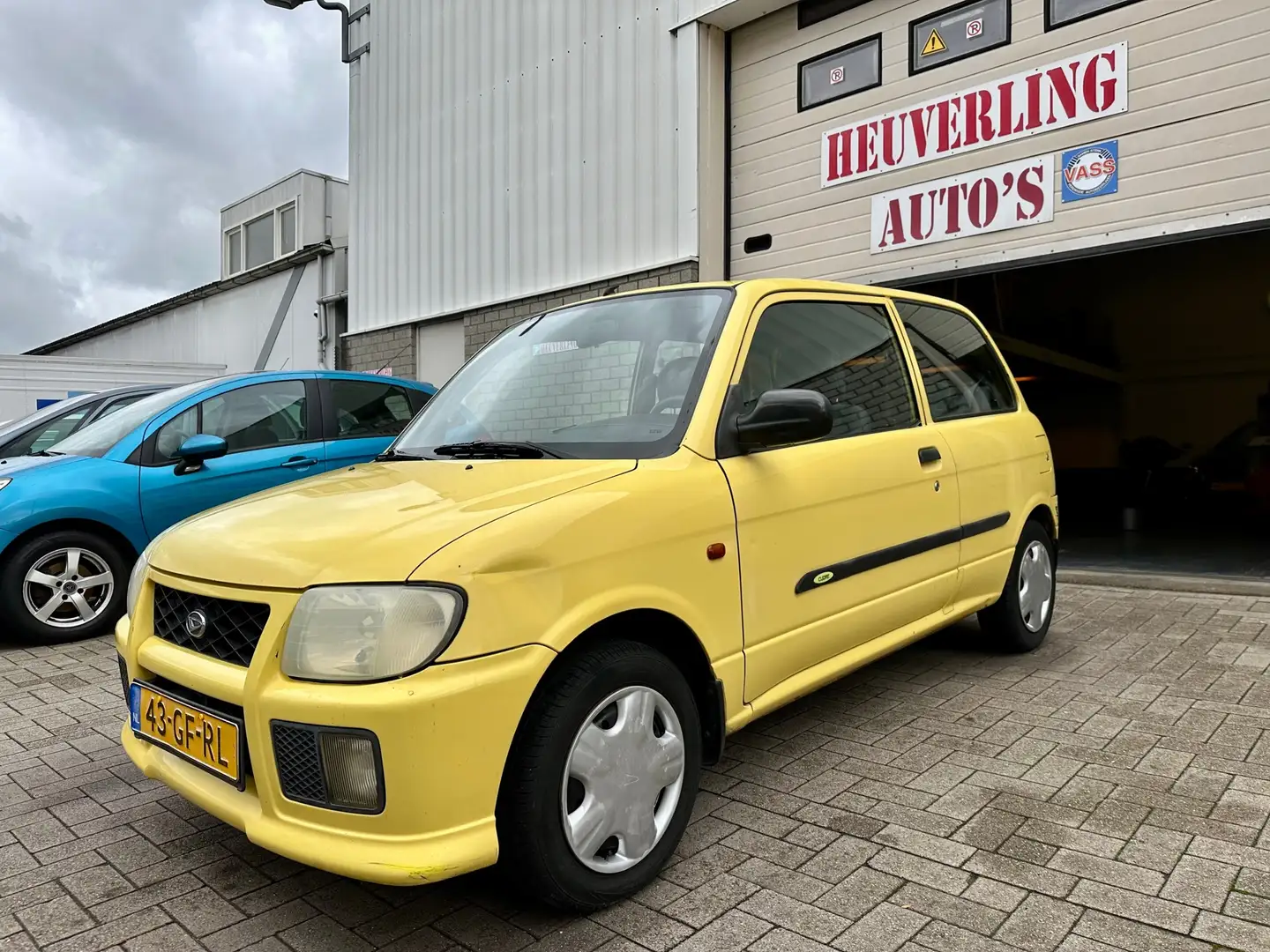 Daihatsu Cuore 1.0-12V XTi | Airco | APK t/m 6-12-26 Geel - 1