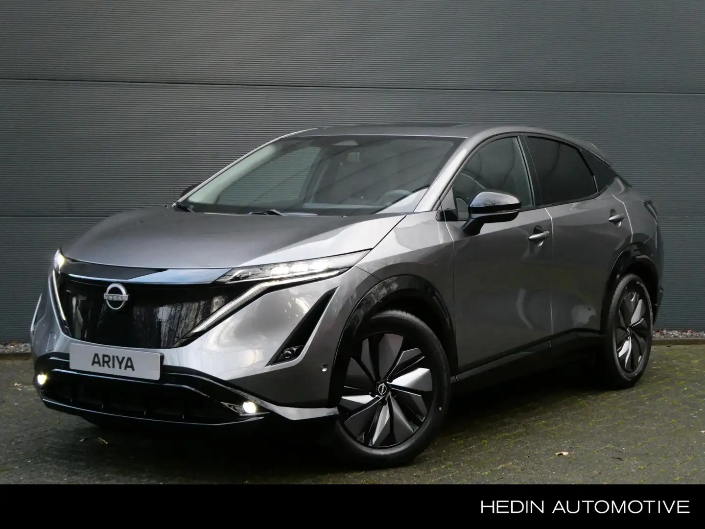 Nissan Ariya e-4ORCE Evolve 87 kWh | Panorama dak | Voorstoelen Grijs - 1
