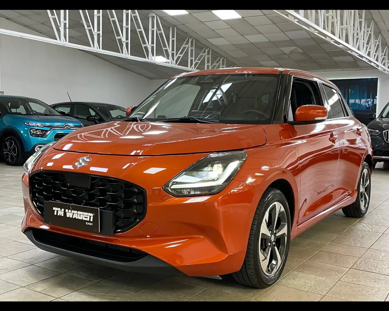 Suzuki Swift HYBRID 1.2 TOP 84CV 2024 Arancione - 1