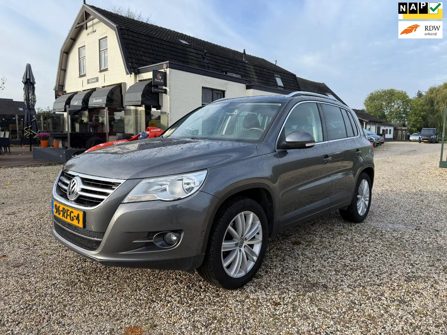 Volkswagen Tiguan 1.4 TSI Sport&Style TEKST LEZEN | Navi | PDC | Tre Grau - 1