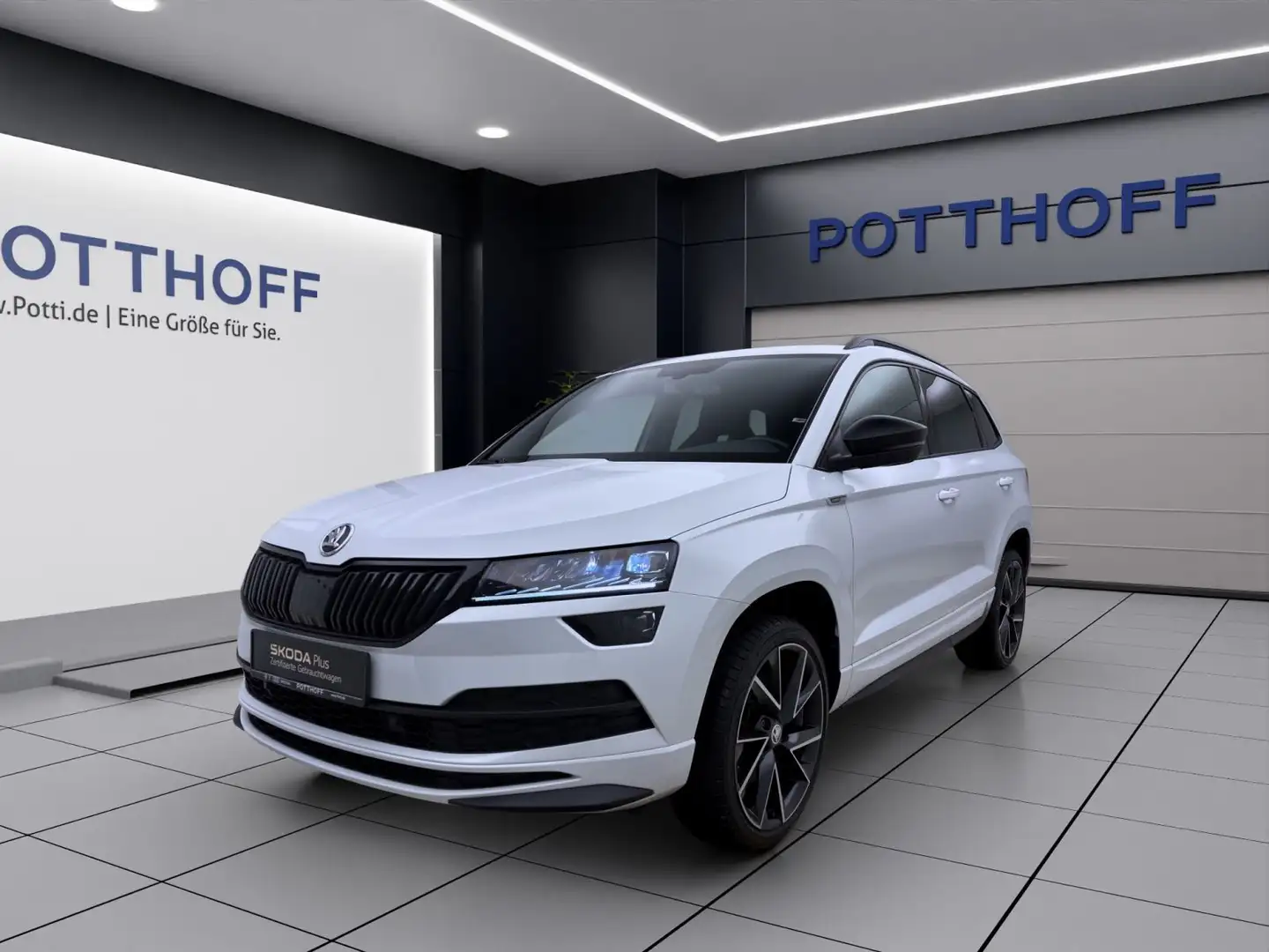 Skoda Karoq 1.5 TSI DSG SPORTLINE NAVI AHK KAMERA KLIM Weiß - 1
