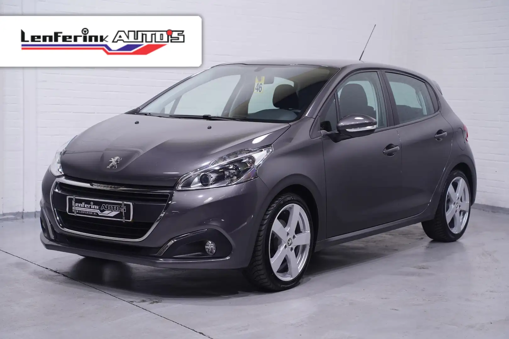 Peugeot 208 1.2 PureTech Blue Lion Navi PDC Cruise Apple/Andro Grau - 1
