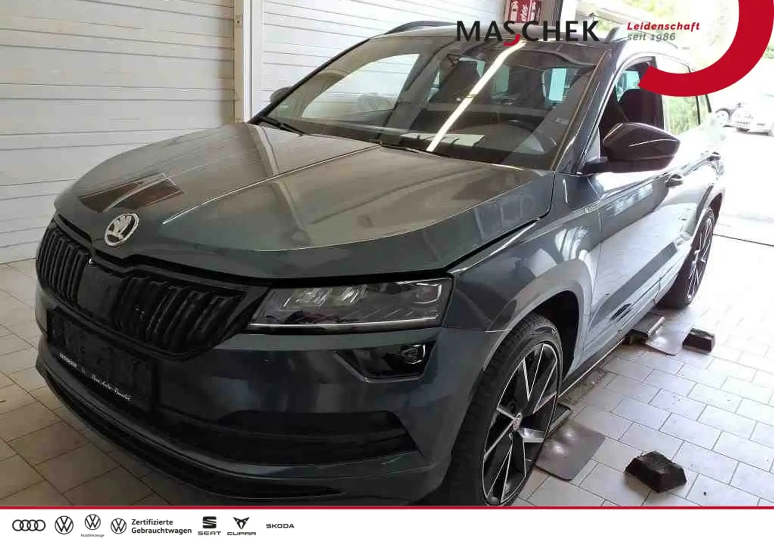 Skoda Karoq Sportline 2.0 TDI DSG 4x4 AHK ACC Amundsen AHK ACC Grau - 1