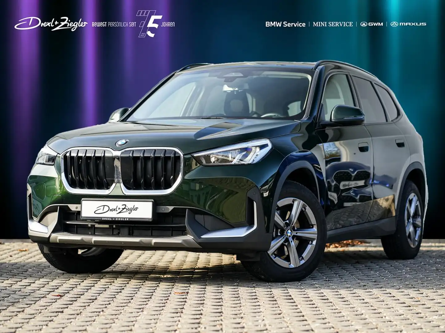 BMW X1 sDrive18i AHK PANO RFK SpSitze TravelPaket Verde - 1