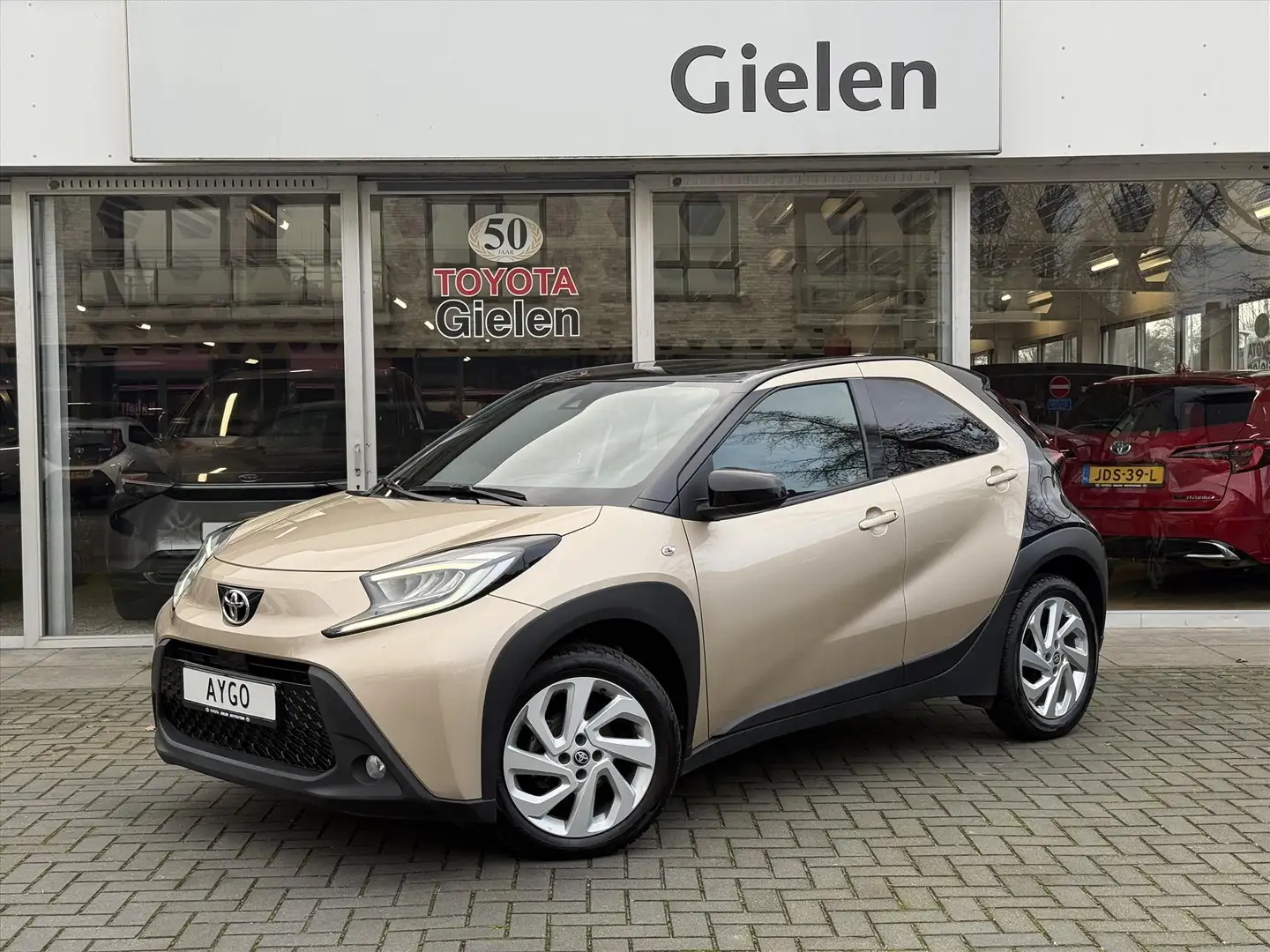 Toyota Aygo X 1.0 VVT-i Pulse Automaat | Stoelverwarming, Apple Brun - 1