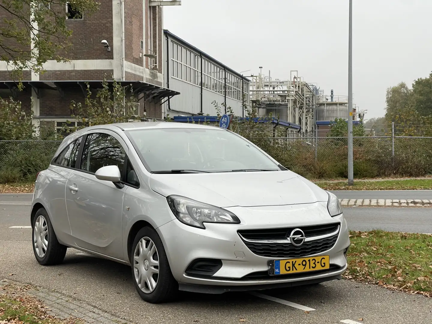 Opel Corsa-e 1.0 Turbo Business+ | Navigatie | Airco | Trekhaak Grau - 1