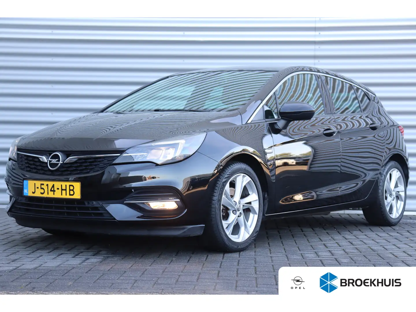 Opel Astra 1.2 TURBO 130PK ELEGANCE+ / NAVI / LEDER / CLIMA / Zwart - 1