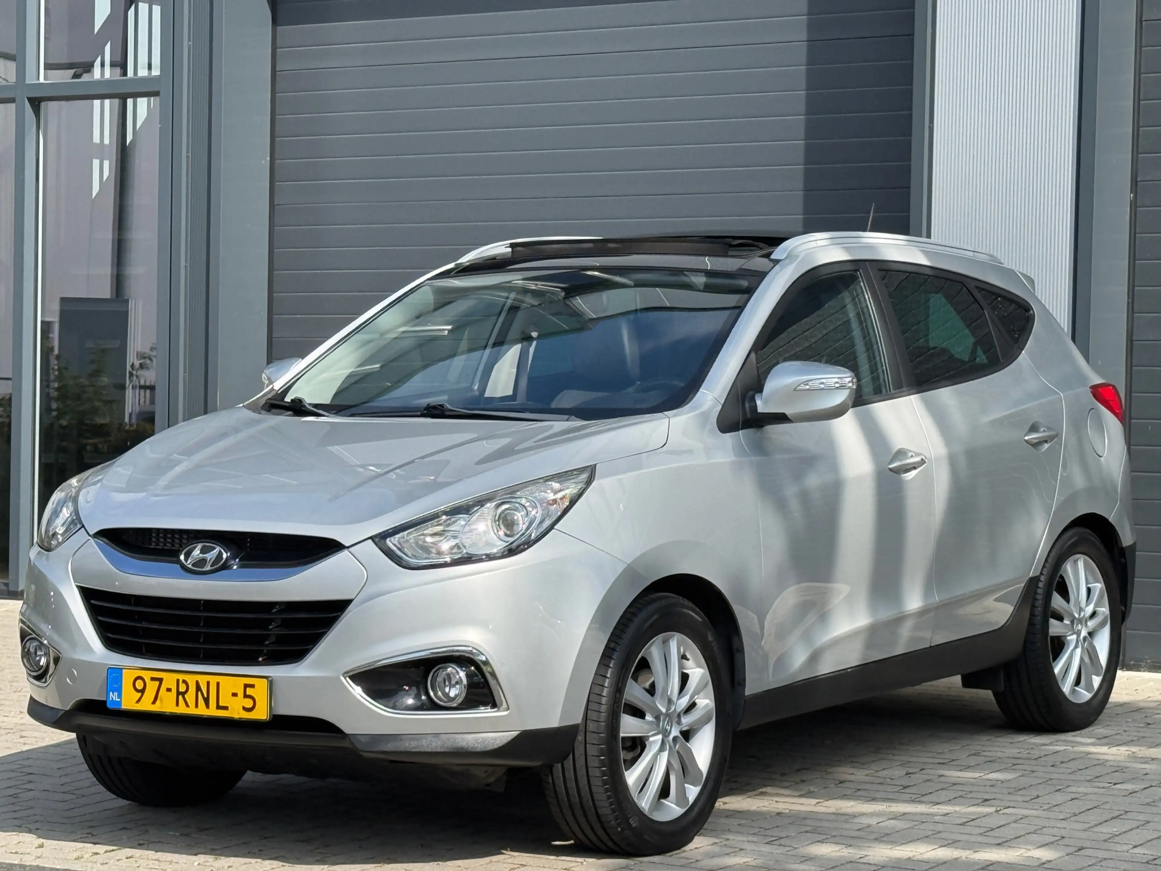 Hyundai iX35 2.0i 4WD i-Catcher / AUTOMAAT / SCHUIFDAK / NAP — photo 4