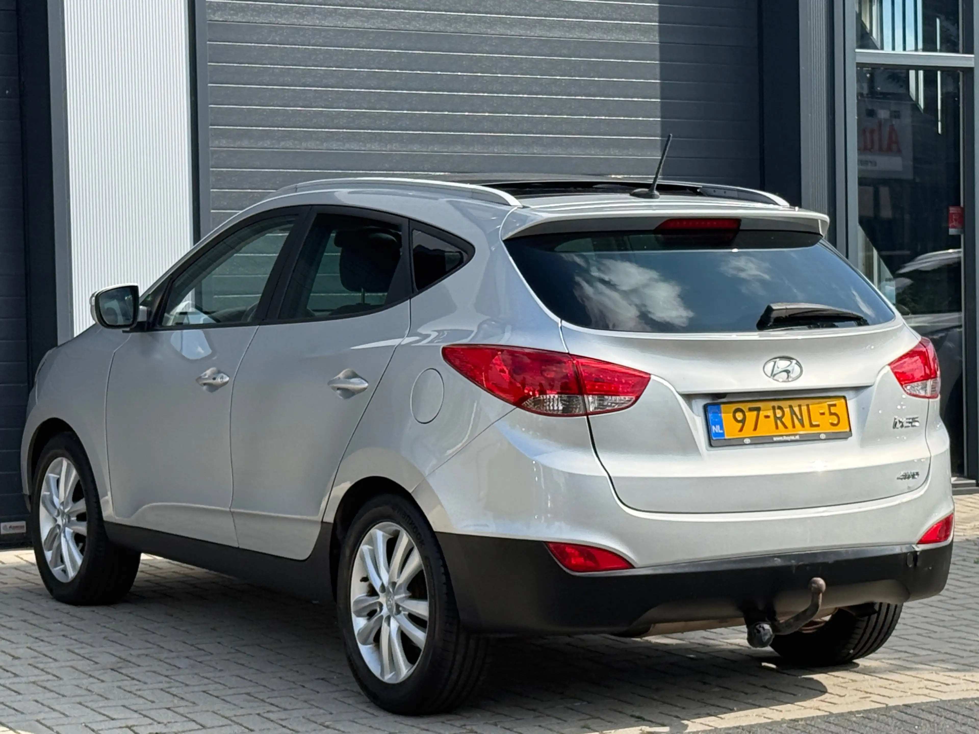 Hyundai iX35 2.0i 4WD i-Catcher / AUTOMAAT / SCHUIFDAK / NAP — photo 13