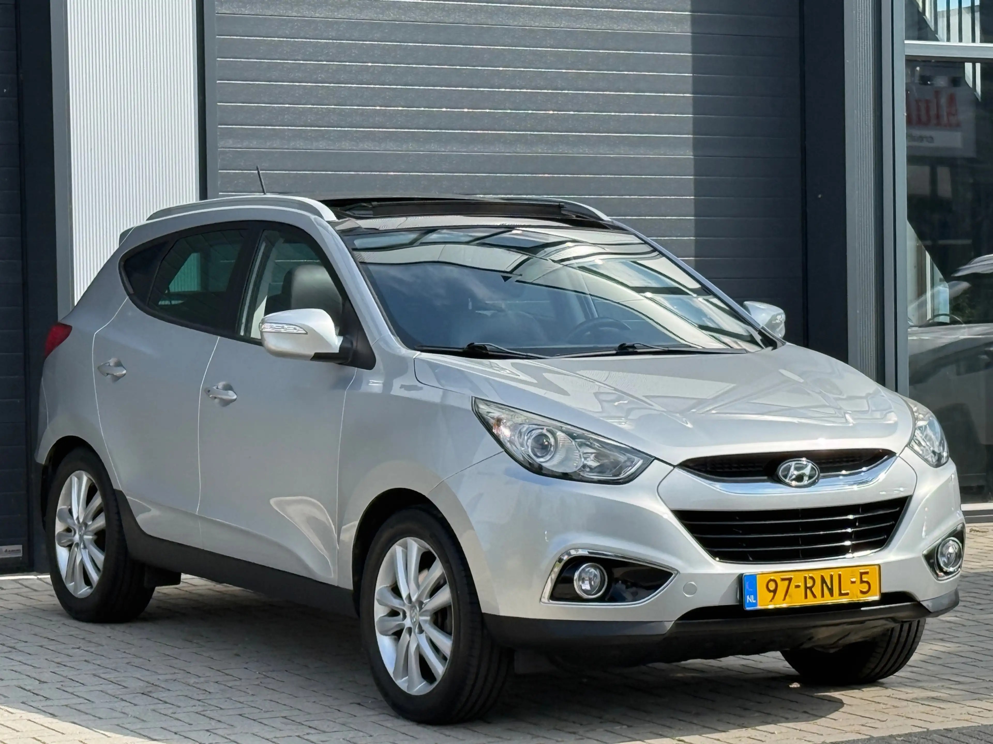 Hyundai iX35 2.0i 4WD i-Catcher / AUTOMAAT / SCHUIFDAK / NAP — photo 12