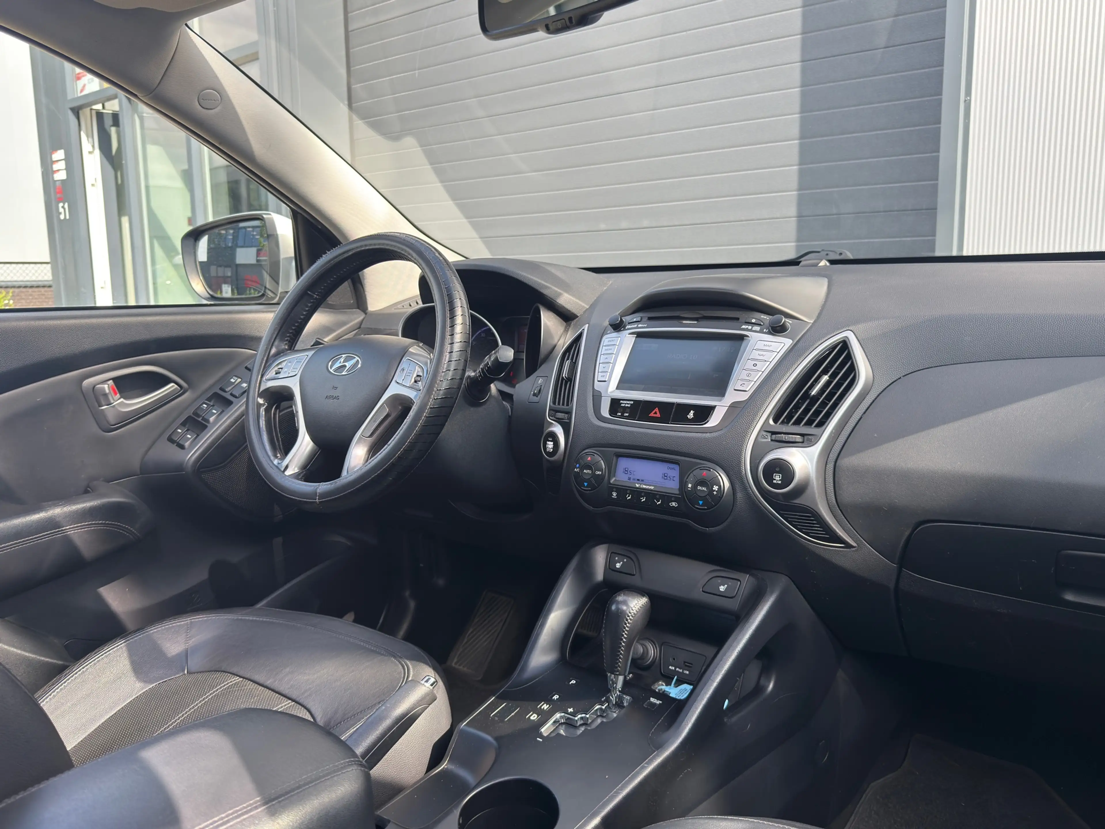 Hyundai iX35 2.0i 4WD i-Catcher / AUTOMAAT / SCHUIFDAK / NAP — photo 2