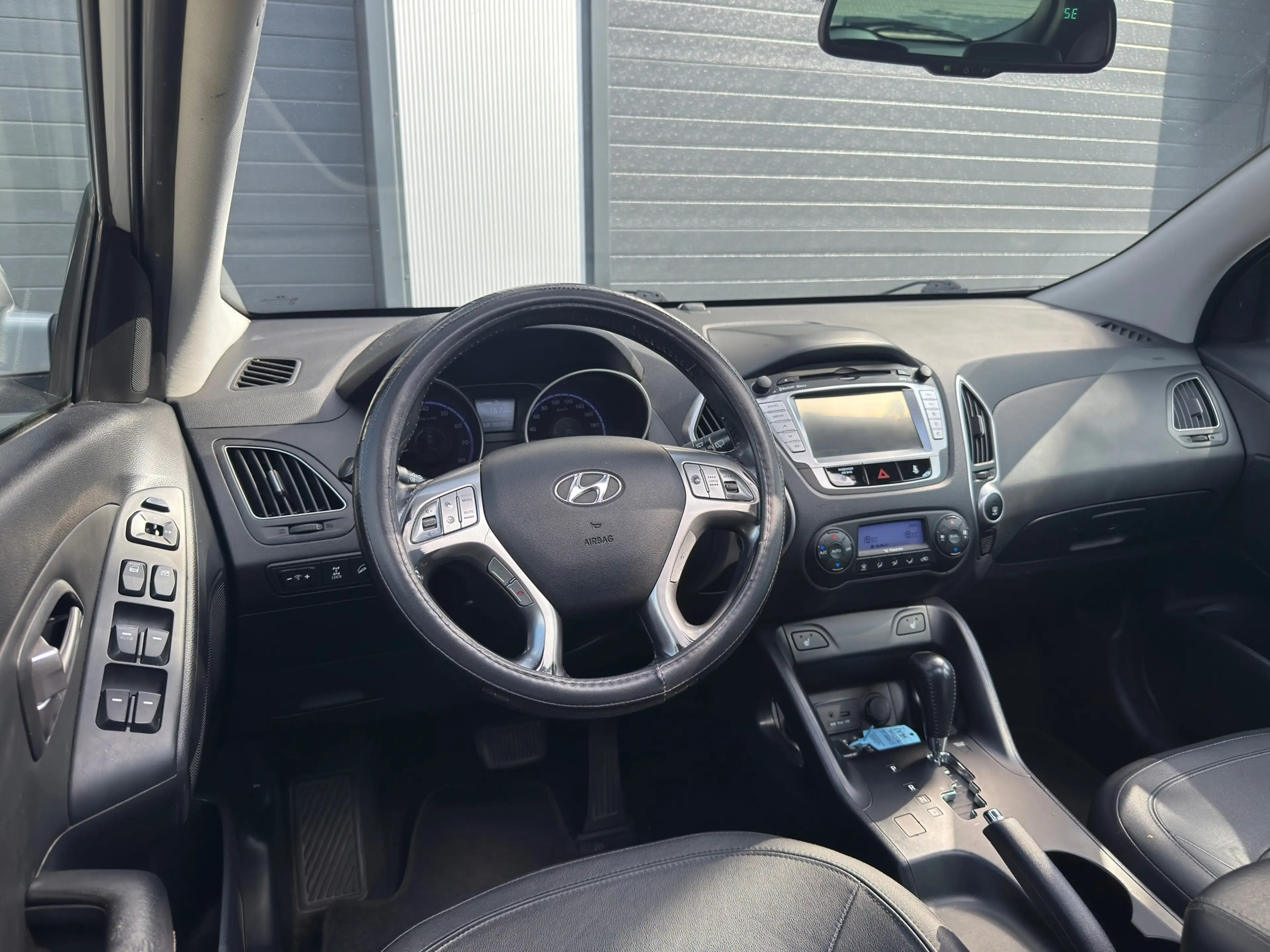 Hyundai iX35 2.0i 4WD i-Catcher / AUTOMAAT / SCHUIFDAK / NAP — photo 7