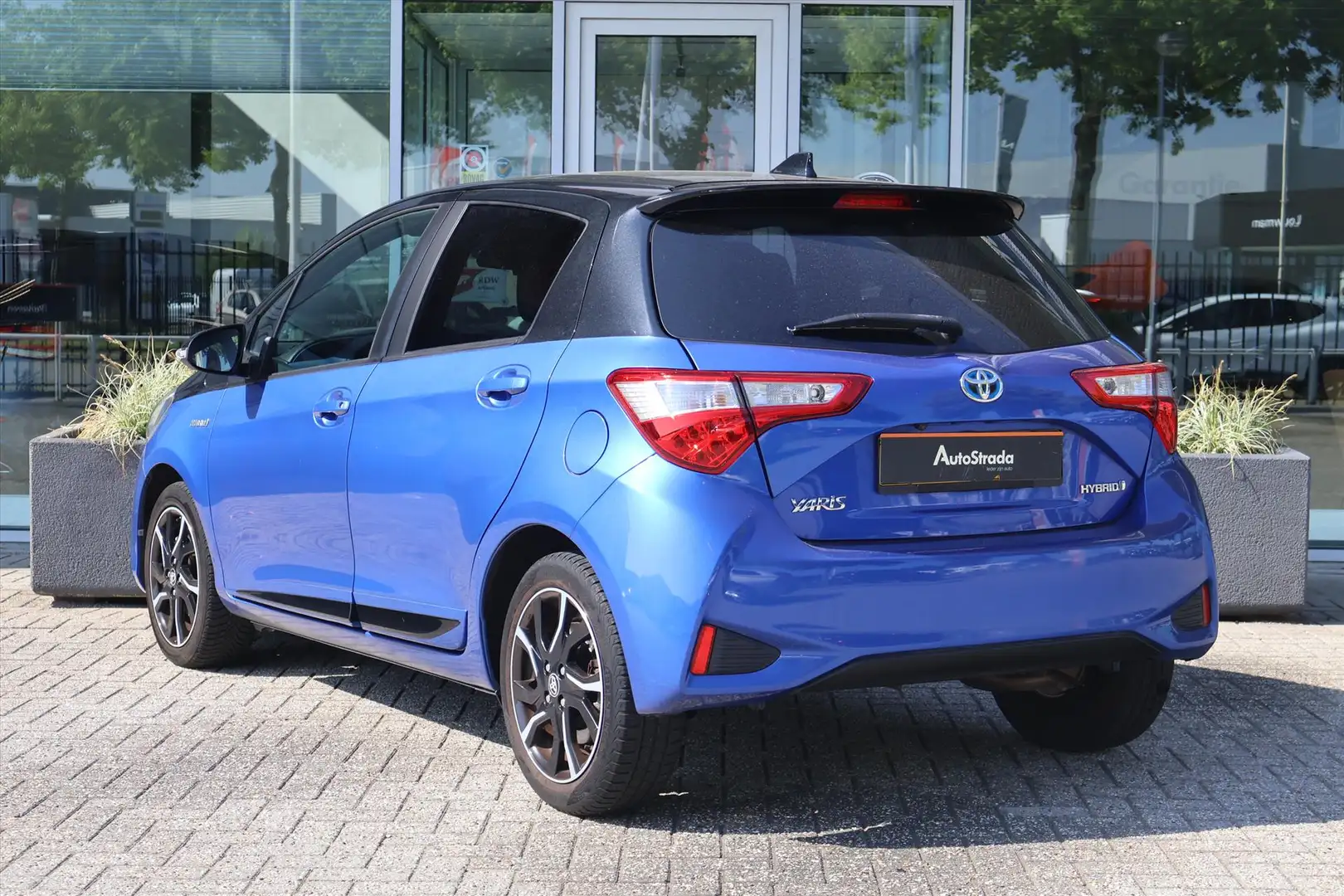Toyota Yaris 1.5 Hybrid Bi-Tone 100pk 5D CVT | LED | Cruise | C Blauw - 2