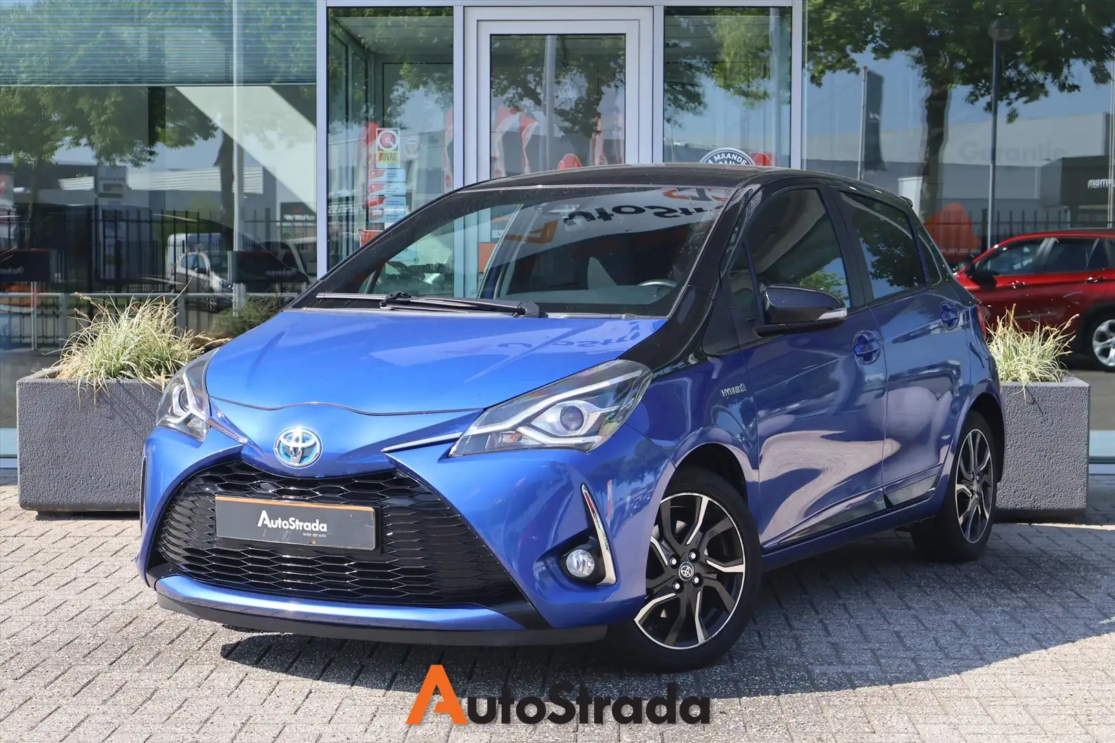 Toyota Yaris 1.5 Hybrid Bi-Tone 100pk 5D CVT | LED | Cruise | C Blauw - 1