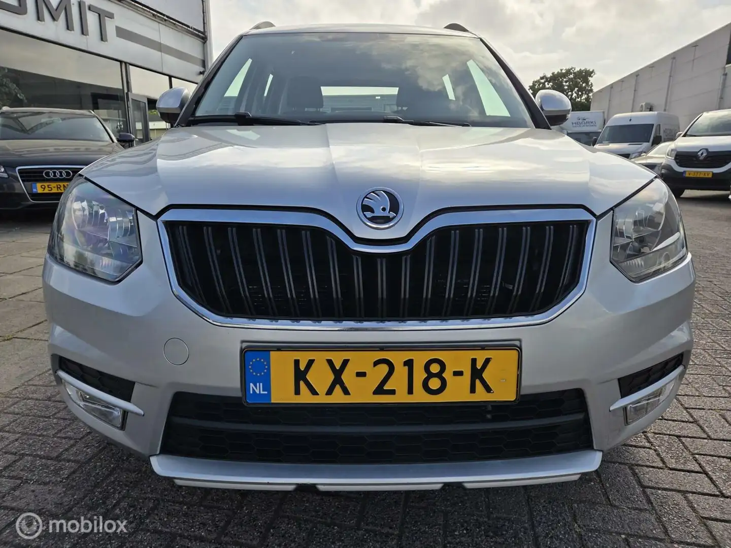 Skoda Yeti 1.2 TSI Ambition AUT/NAV/PDC/CC/Trekhaak/Dealer Gris - 2