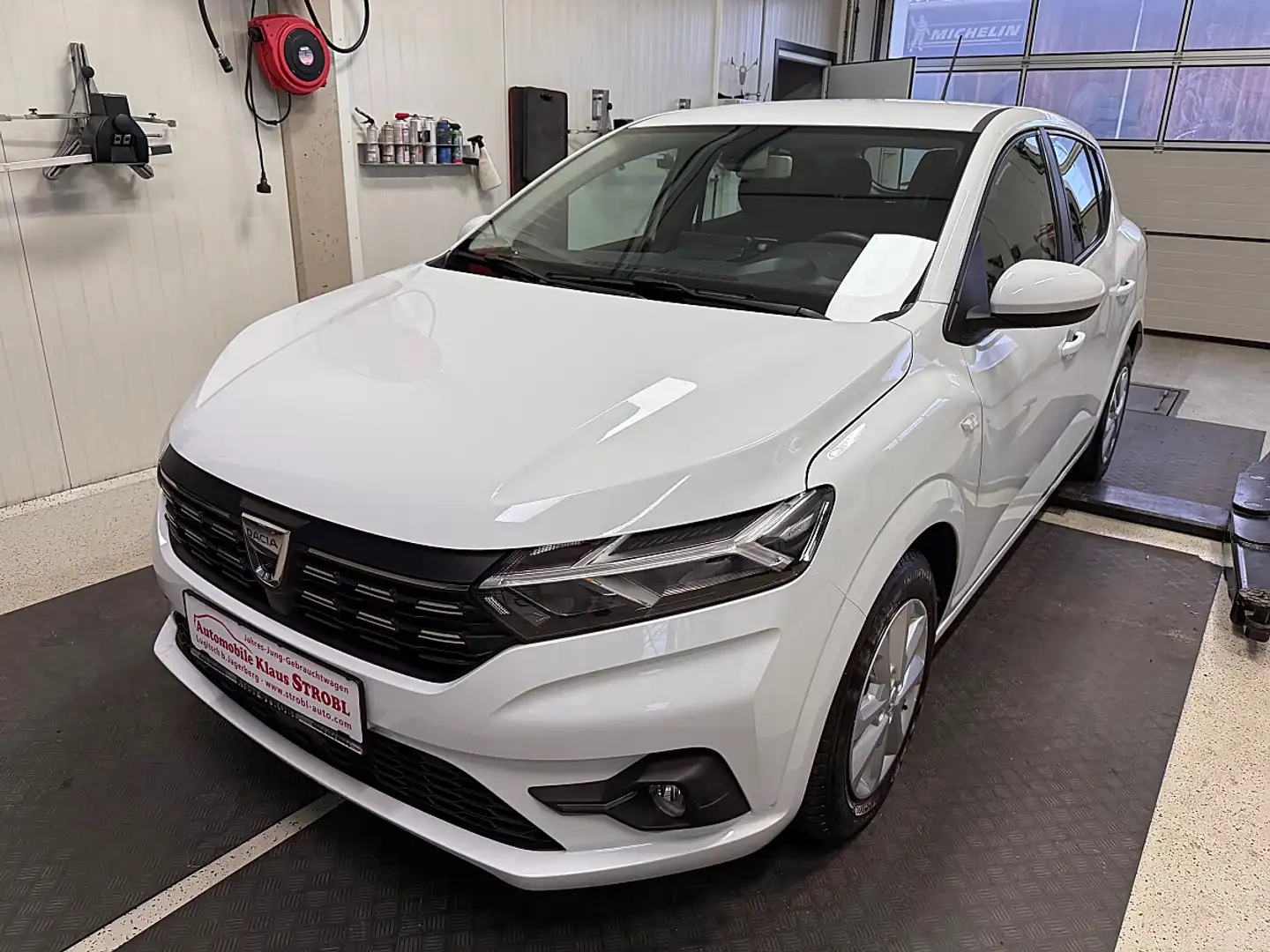 Dacia Sandero Comfort SCe 65 *NAVI-LED* Weiß - 1