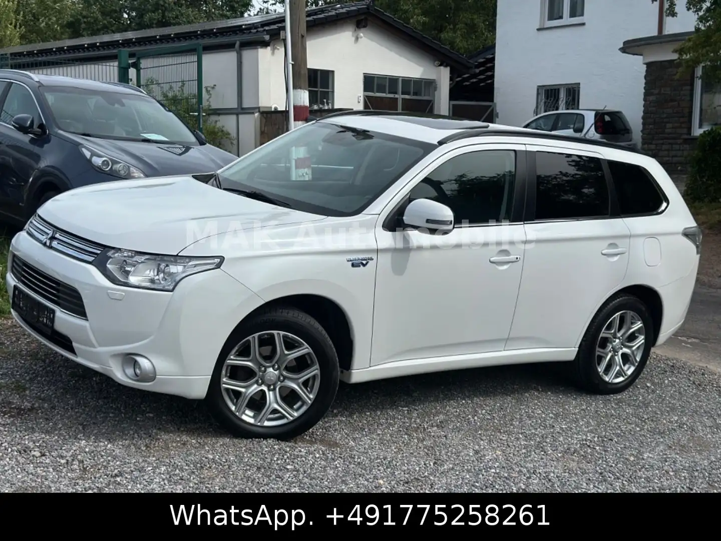 Mitsubishi Outlander PHEV Top 4WD,Pano,leder,Kam,Eu6 Weiß - 1