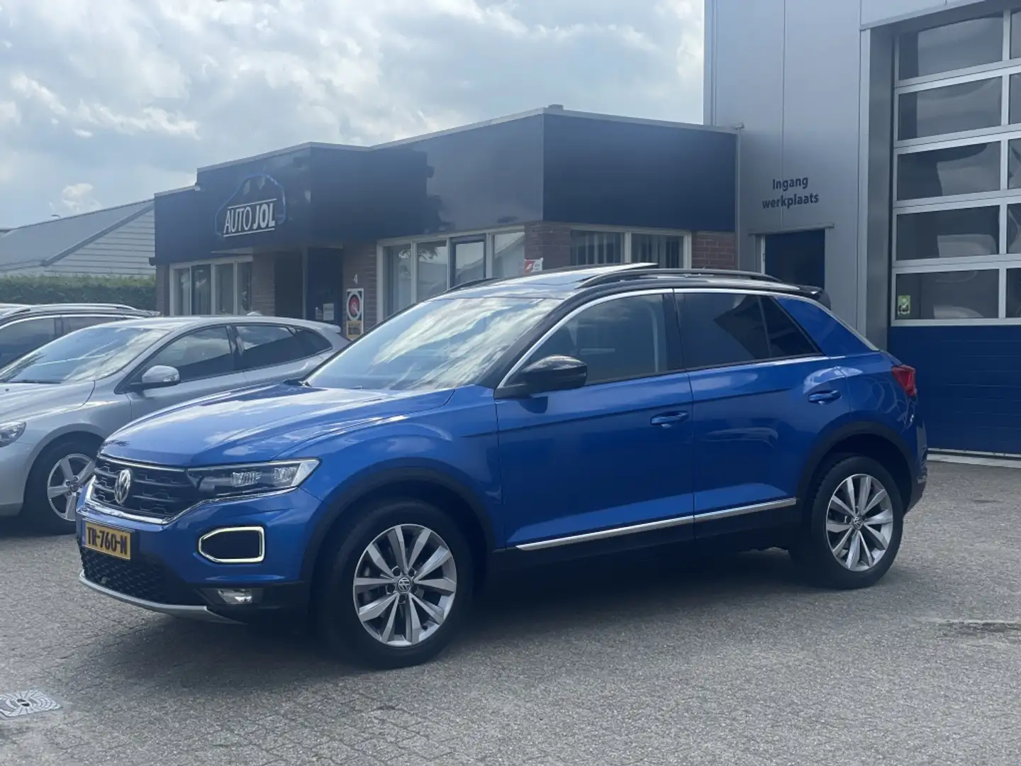 Volkswagen T-Roc 1.0 TSI Style | achteruitrijcamera | trekhaak | na Blauw - 1