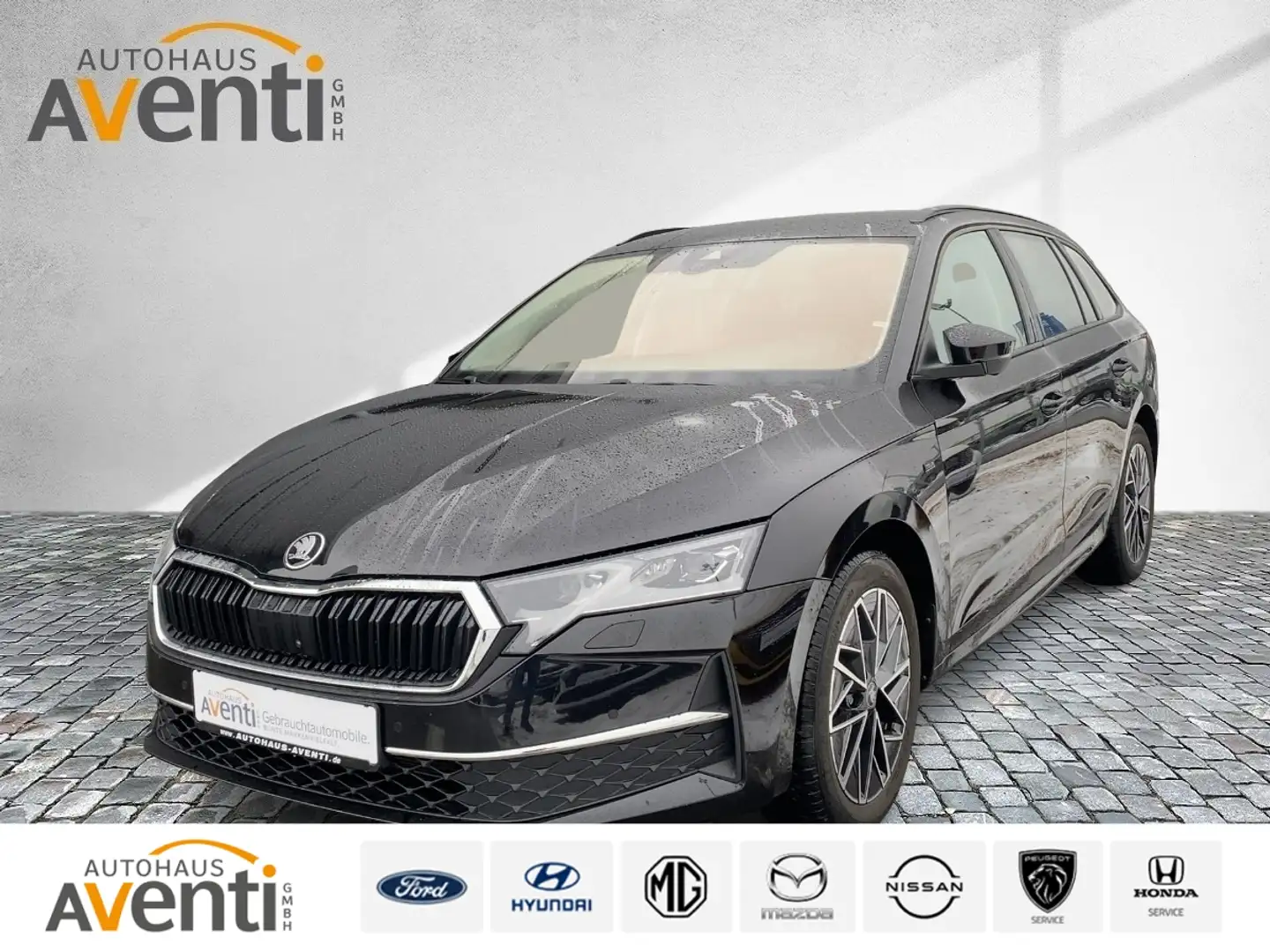 Skoda Octavia Combi 2.0 TDI  W Tour Standheiz.*DSG*ACC* Schwarz - 1