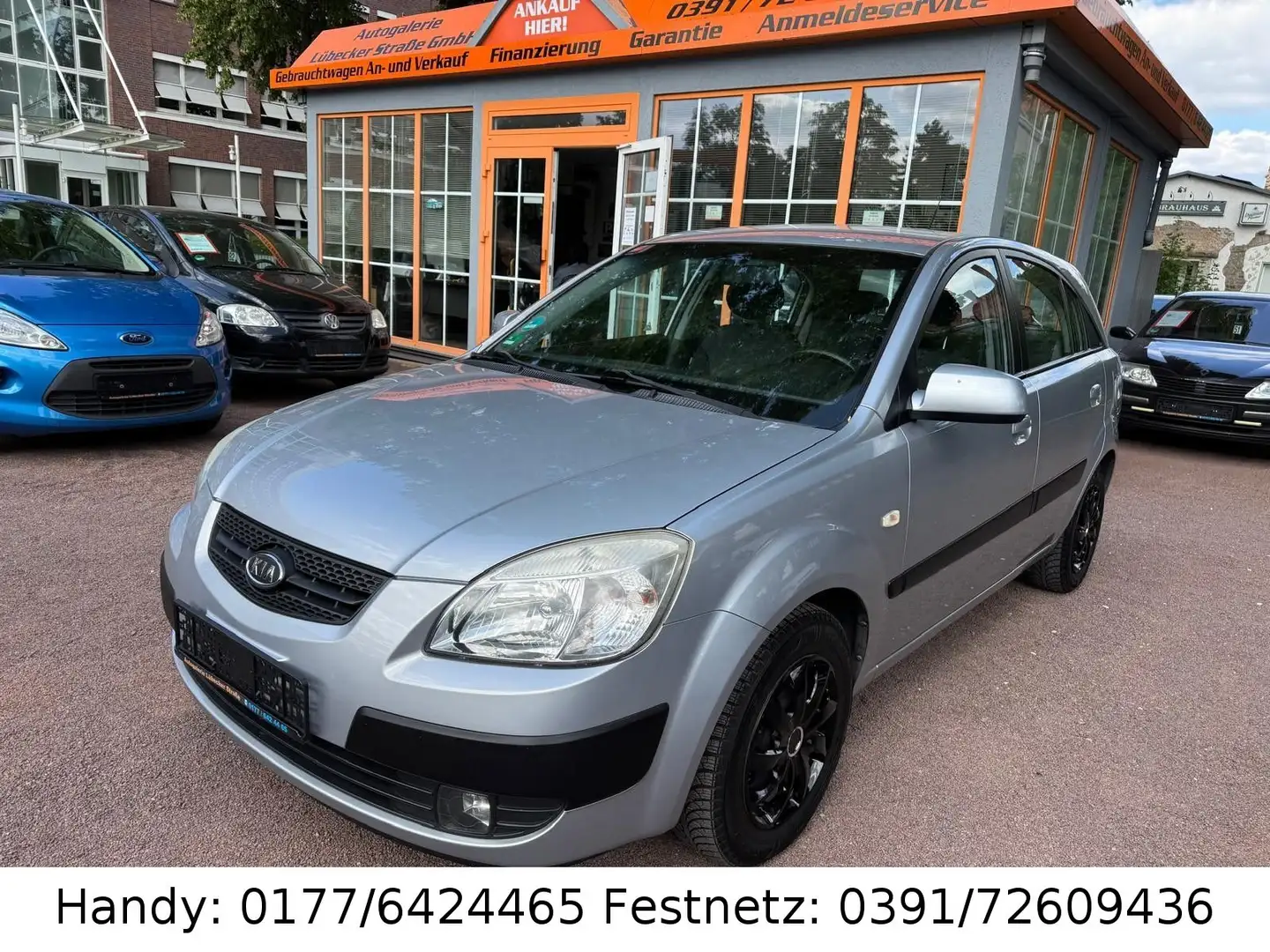 Kia Rio 1.4 KLIMA/4xel.FH/ZV mit FB/PDC Argent - 1