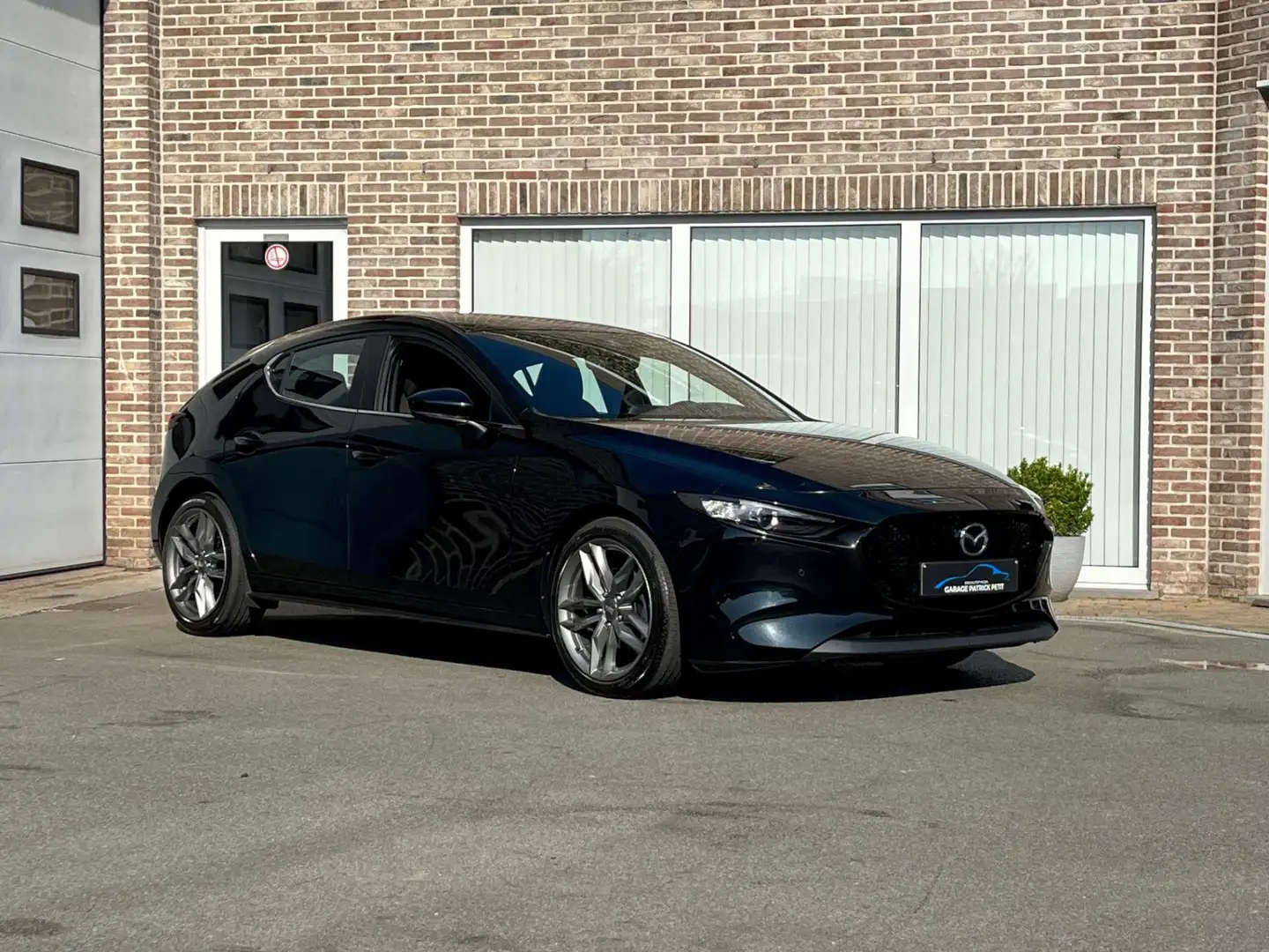 Mazda 3 2.0 M-HYBRID / Camera / Apple / 51000km / 12m wb Zwart - 1