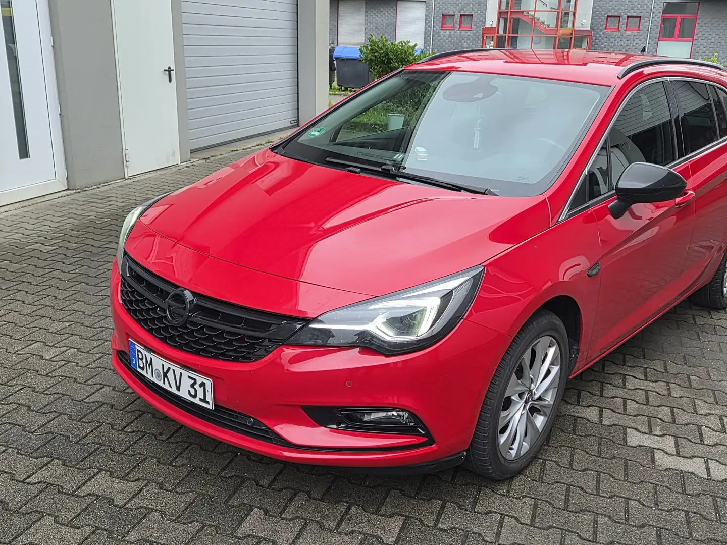 Opel Astra 1.4 ECOTEC CNG Sports Tourer Innovation Rood - 1