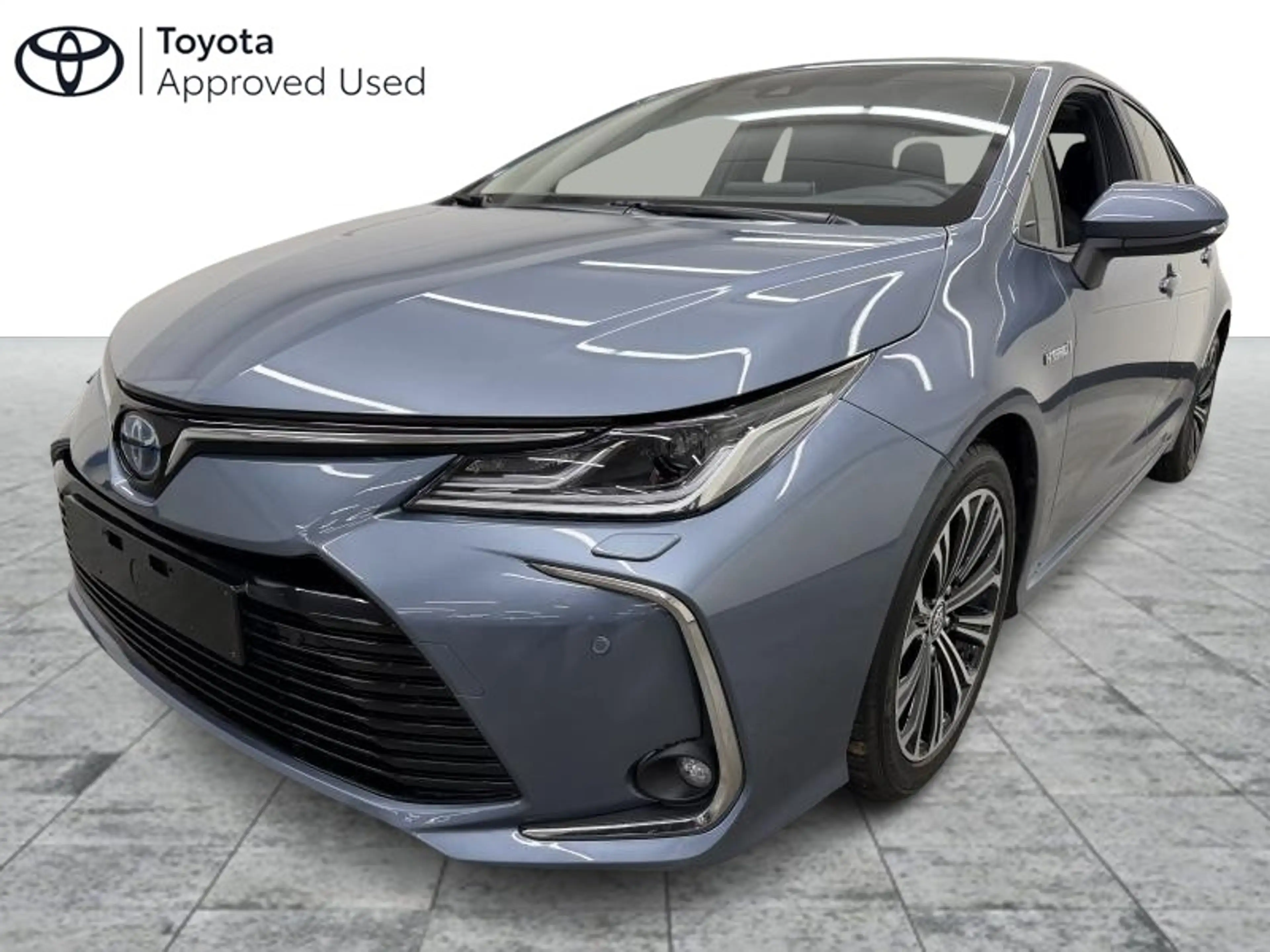 Toyota Corolla Sedan + Premium + Open dak