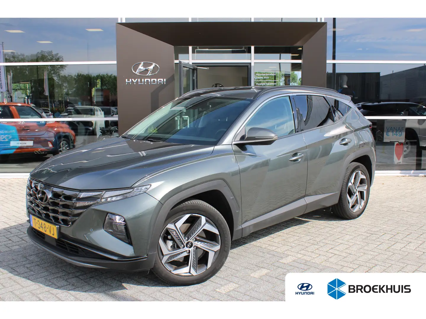 Hyundai TUCSON 1.6 T-GDI PHEV Comfort Smart 4WD | Achteruitrijcam Grijs - 1