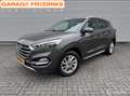 Hyundai TUCSON 1.6 GDi Premium | Navigatie | Stoelverwarming | Bruin - thumbnail 1